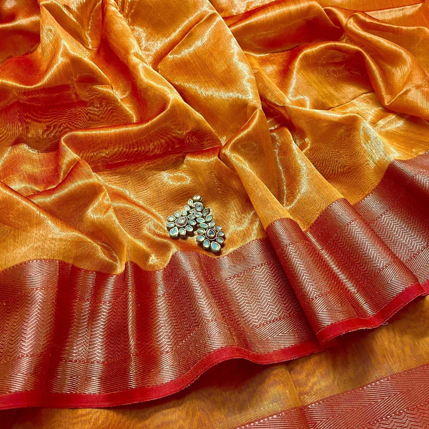 Mustard and red maheshwari tissue silk saree with zari pattern on pallu