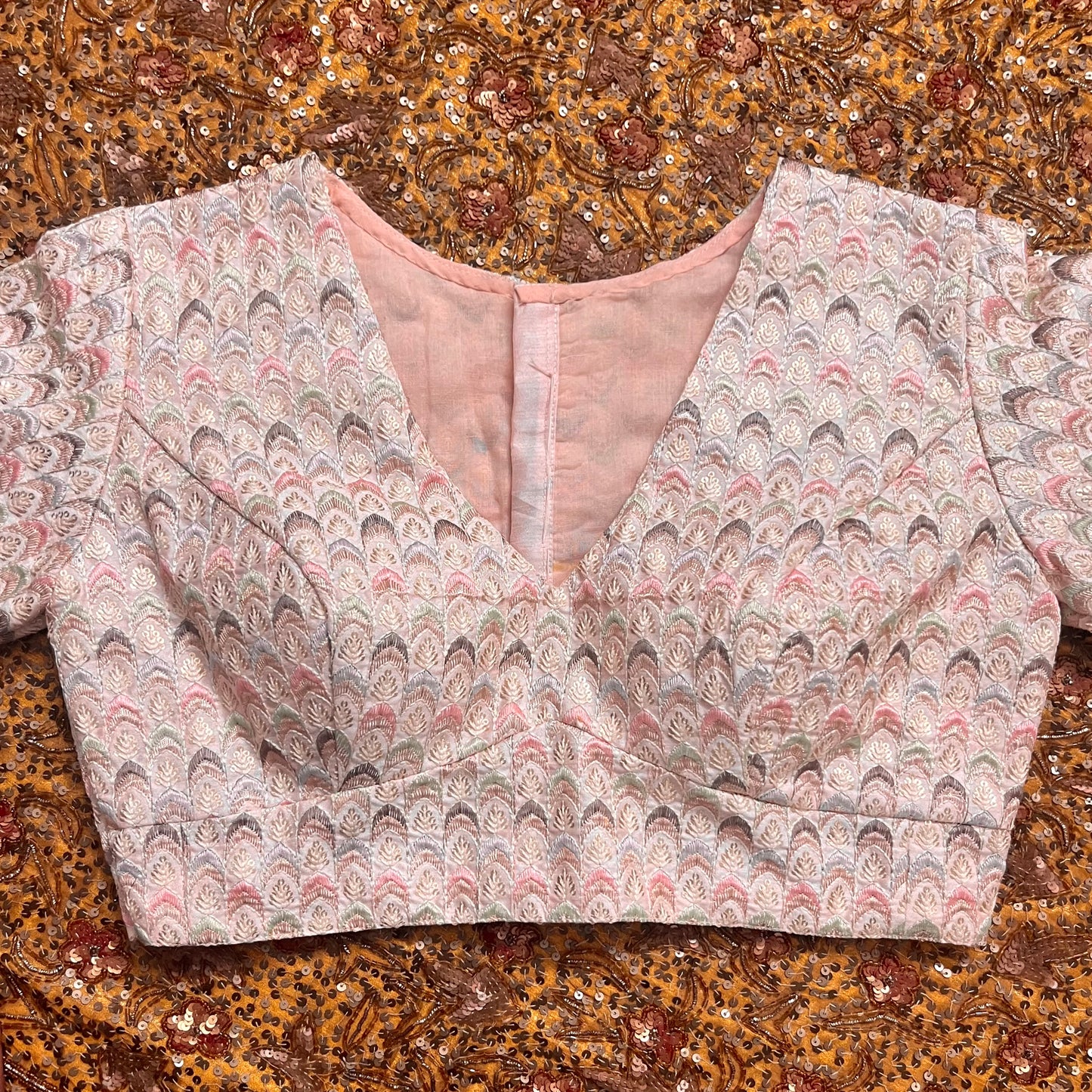 Light pink blouse with threadwork