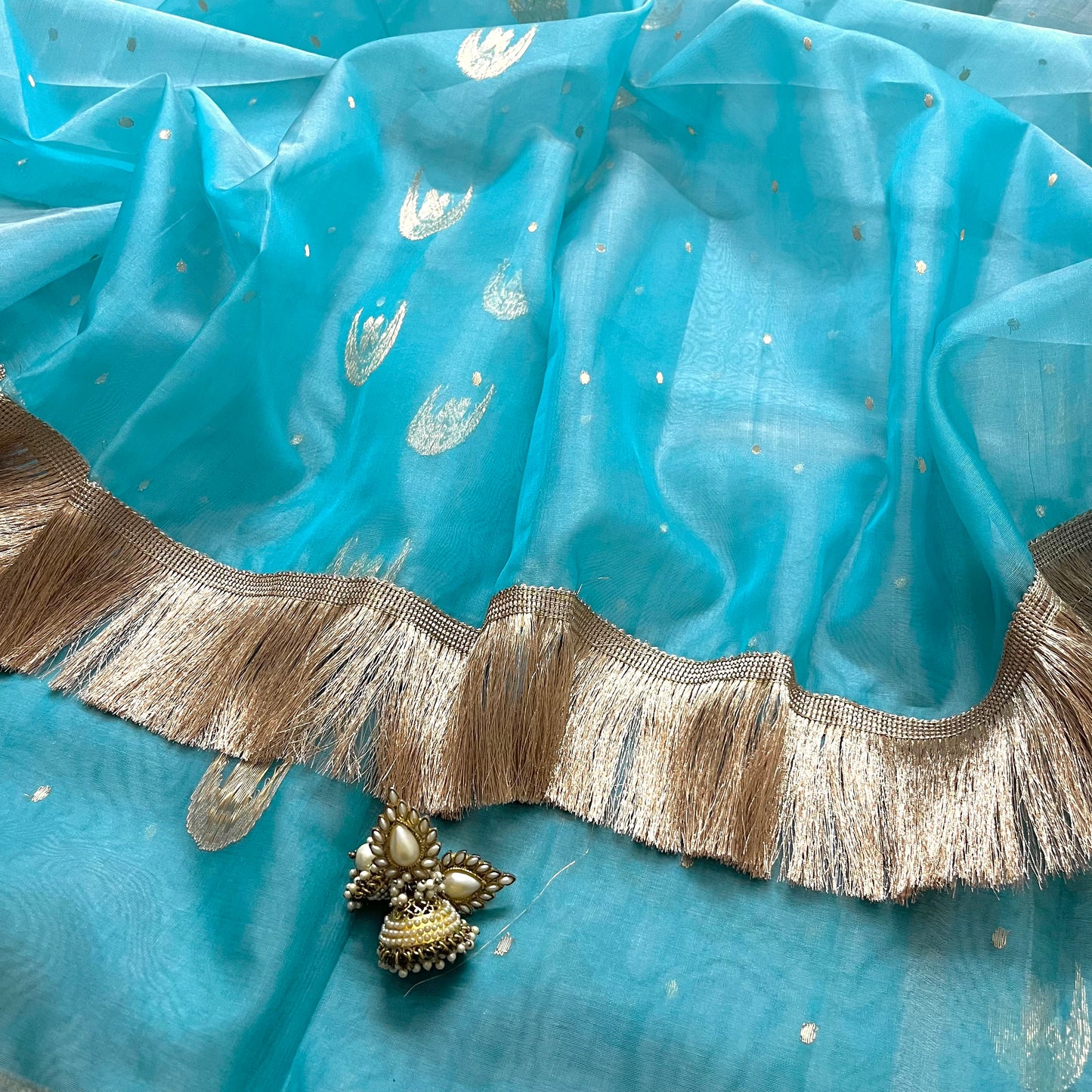 Aqua blue chanderi organza silk saree with zari bootis and chaand bootis all over