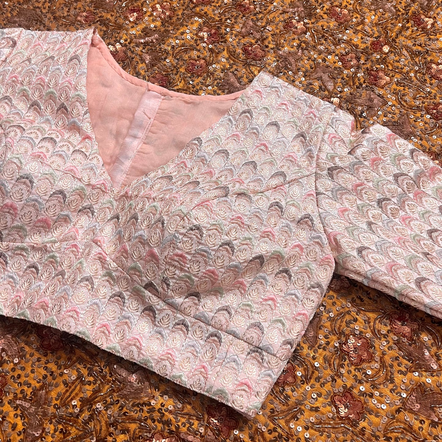 Light pink blouse with threadwork