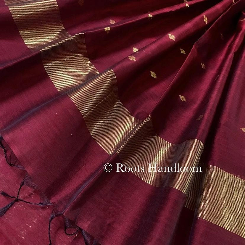 Deep maroon Maheshwari saree with zari bootis all over