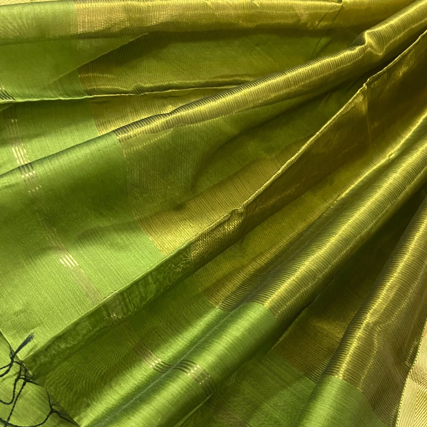 Olive green maheshwari saree with flower motifs all over