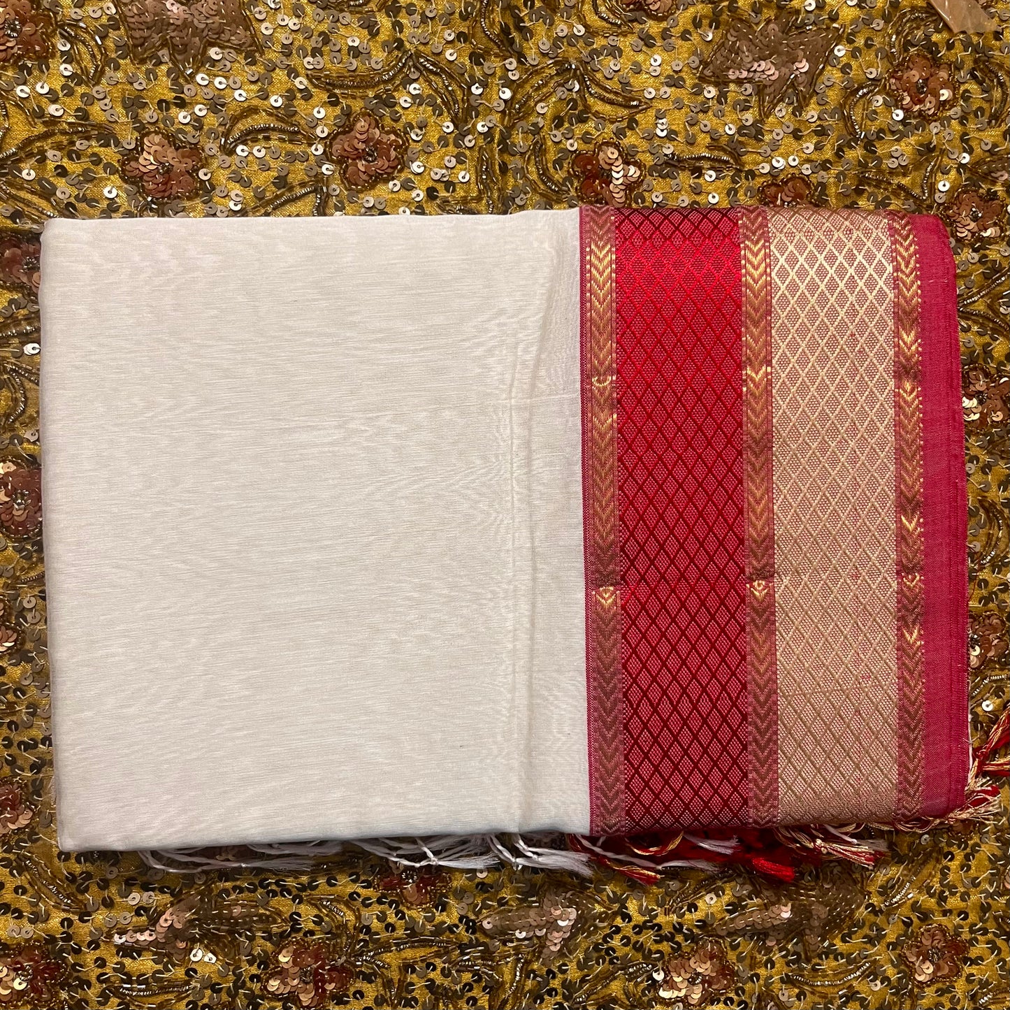 Off white and maheshwari sare with resham border