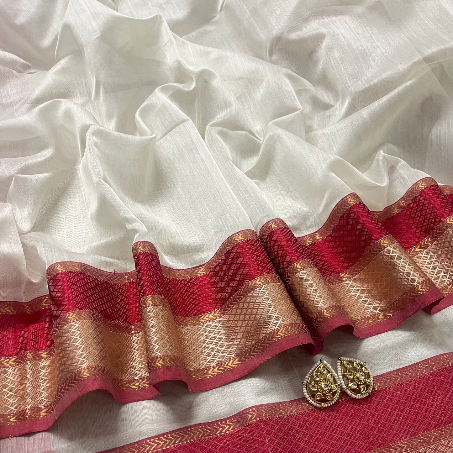 Off white and maheshwari sare with resham border