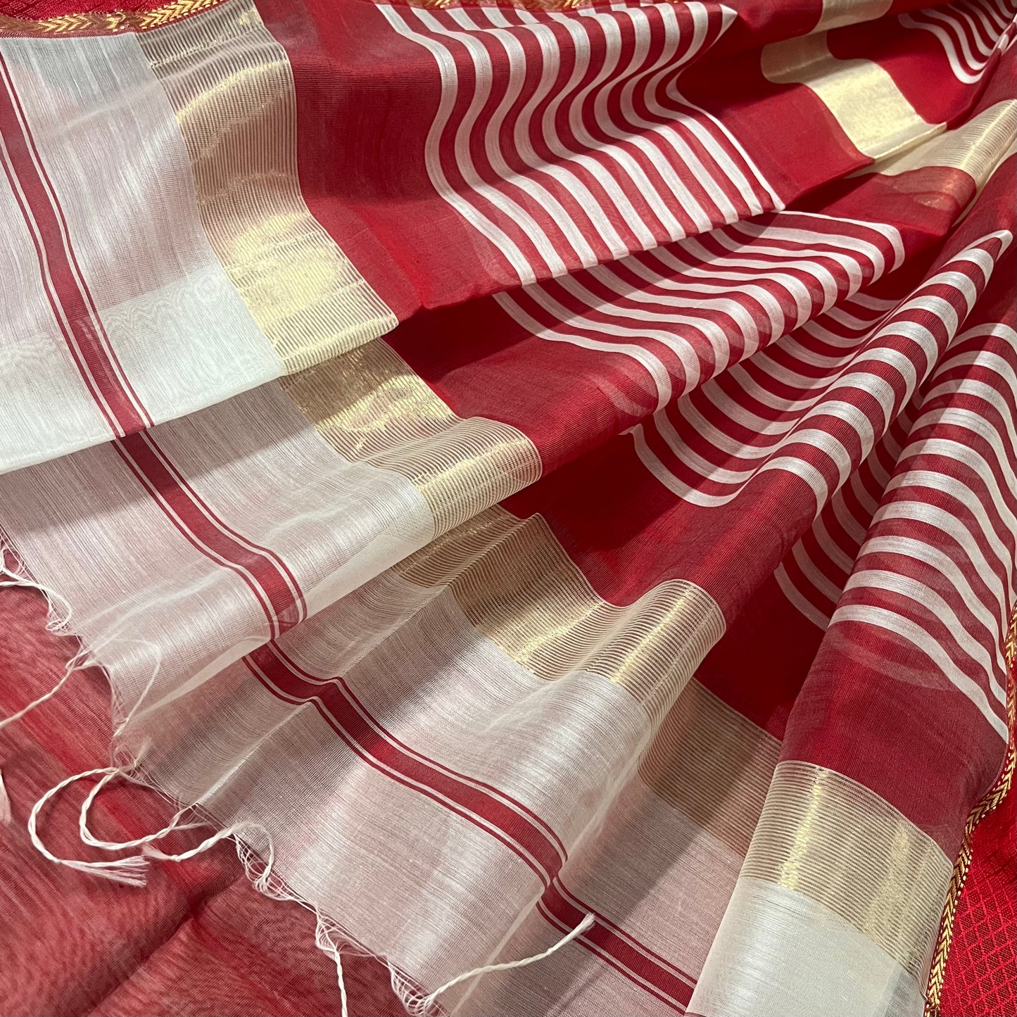 Off white and maheshwari sare with resham border