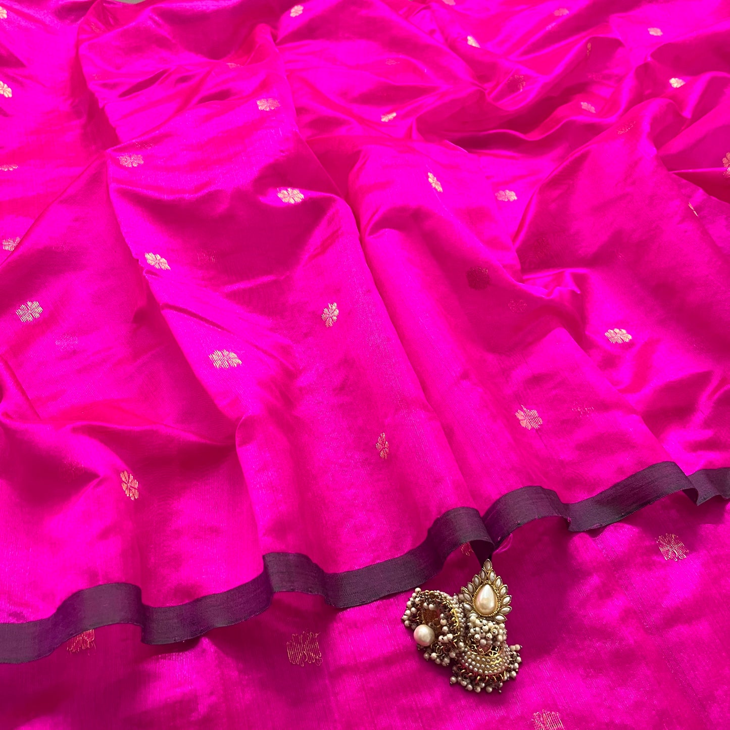 Magenta pink chanderi silk saree with flower bootis all over