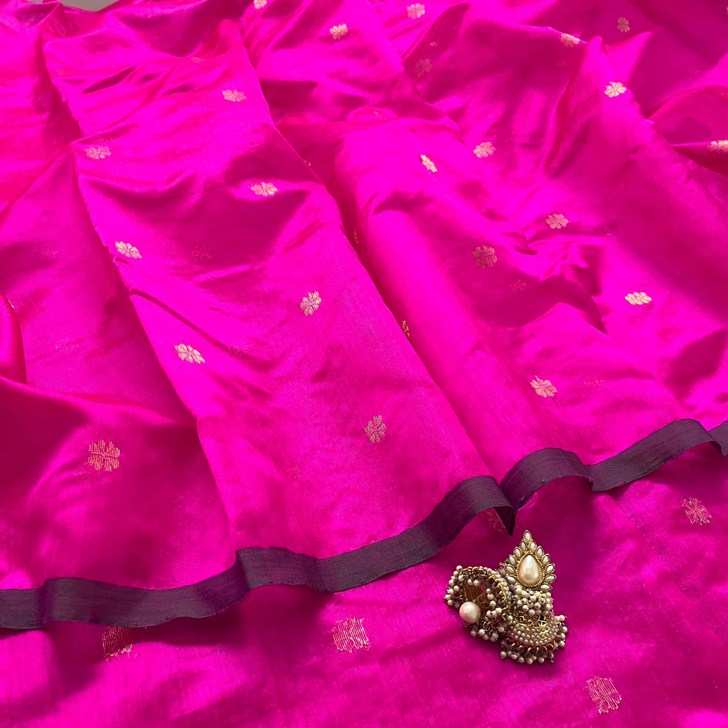 Magenta pink chanderi silk saree with flower bootis all over