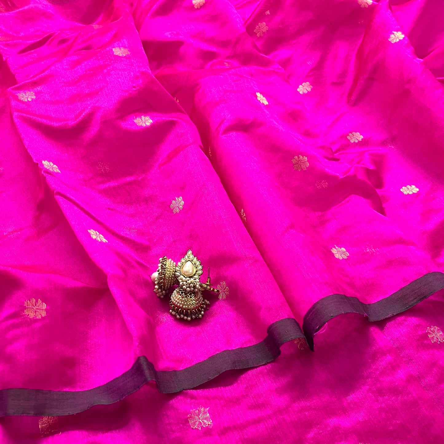 Magenta pink chanderi silk saree with flower bootis all over