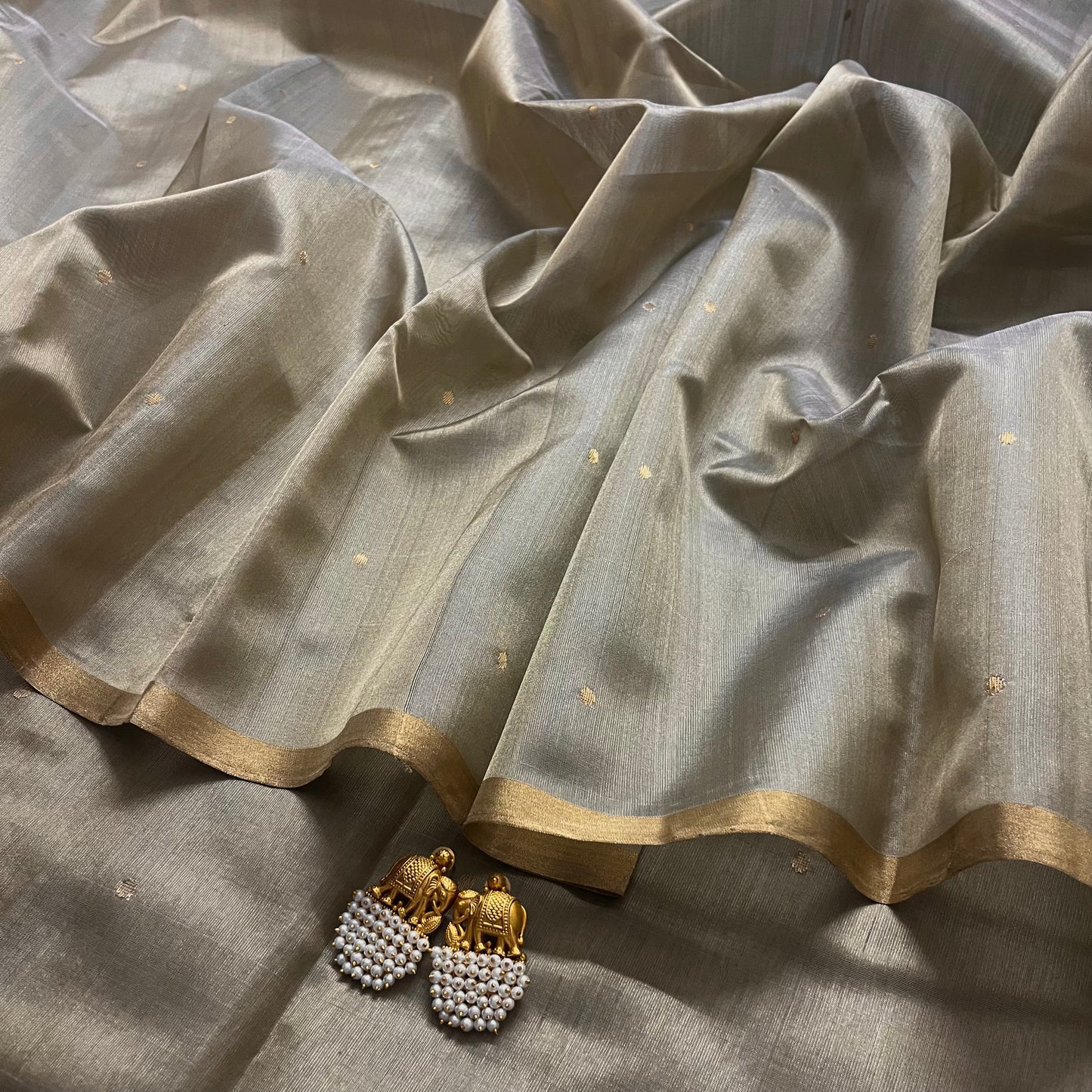 Antique gold chanderi silk saree with zari bootis all over