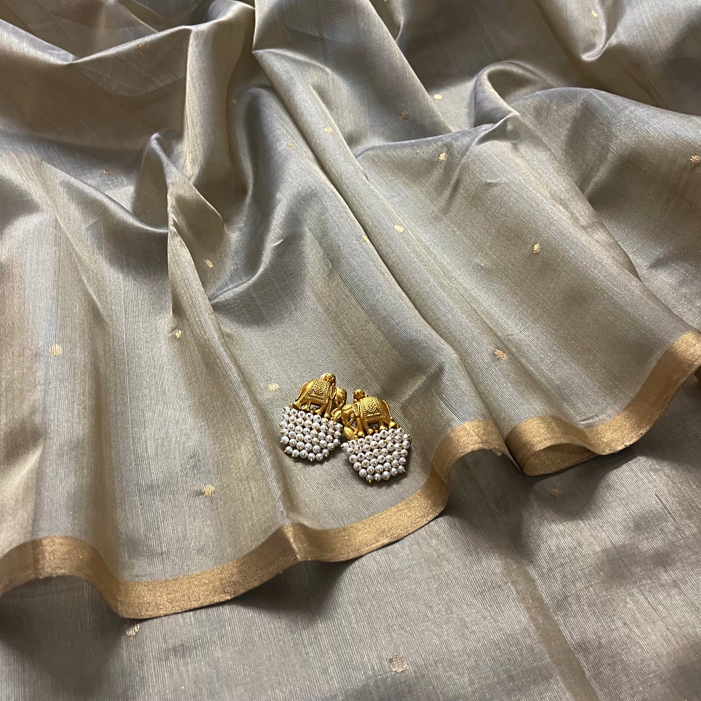 Antique gold chanderi silk saree with zari bootis all over