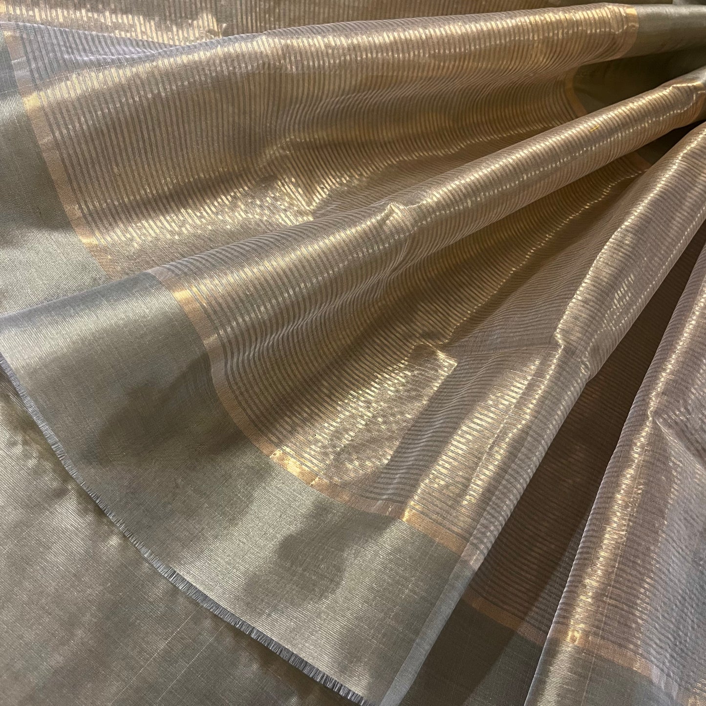 Antique gold chanderi silk saree with zari bootis all over