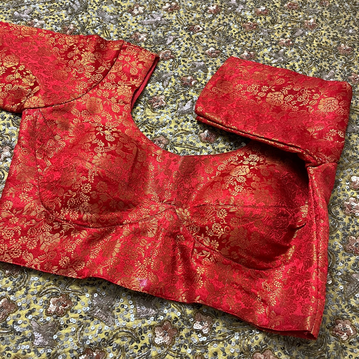 Red stitched padded brocade silk blouse