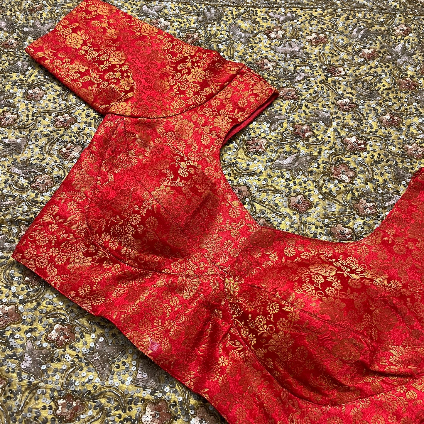 Red stitched padded brocade silk blouse