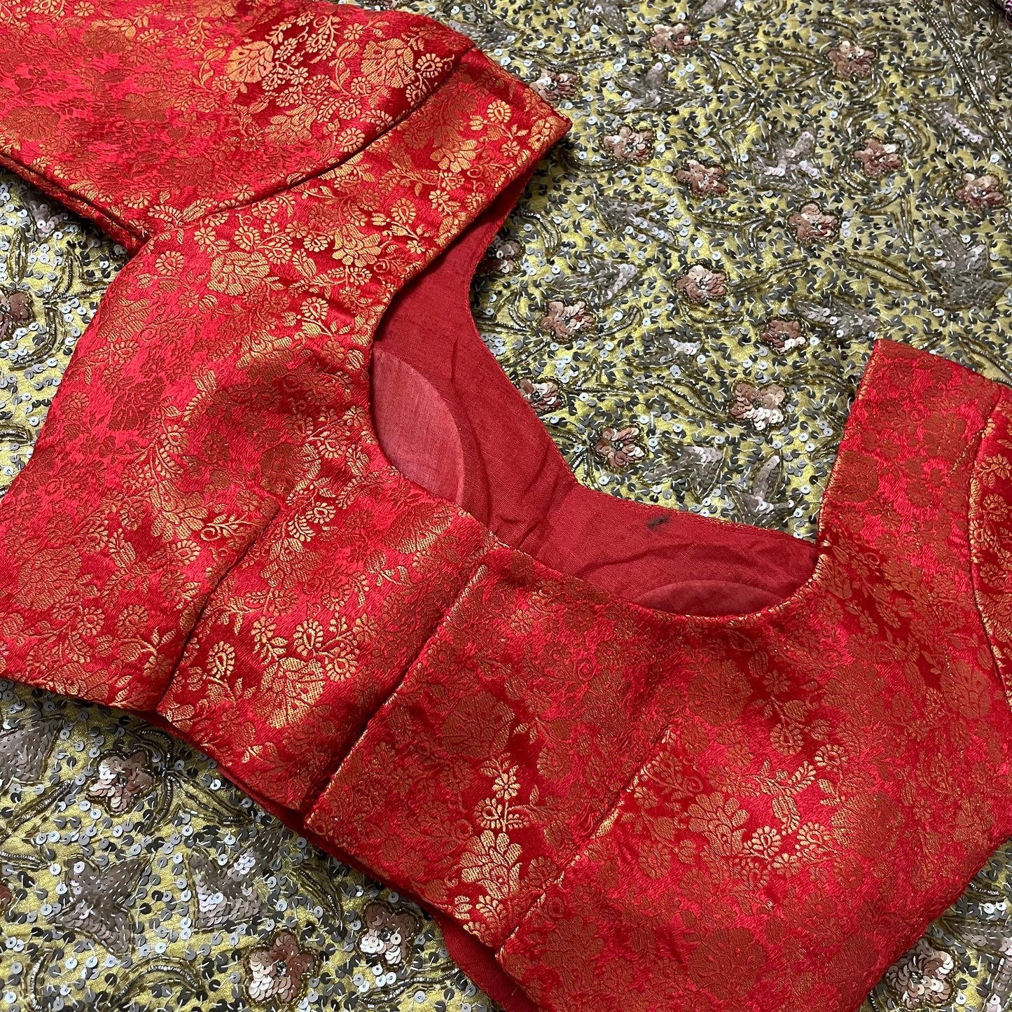 Red stitched padded brocade silk blouse