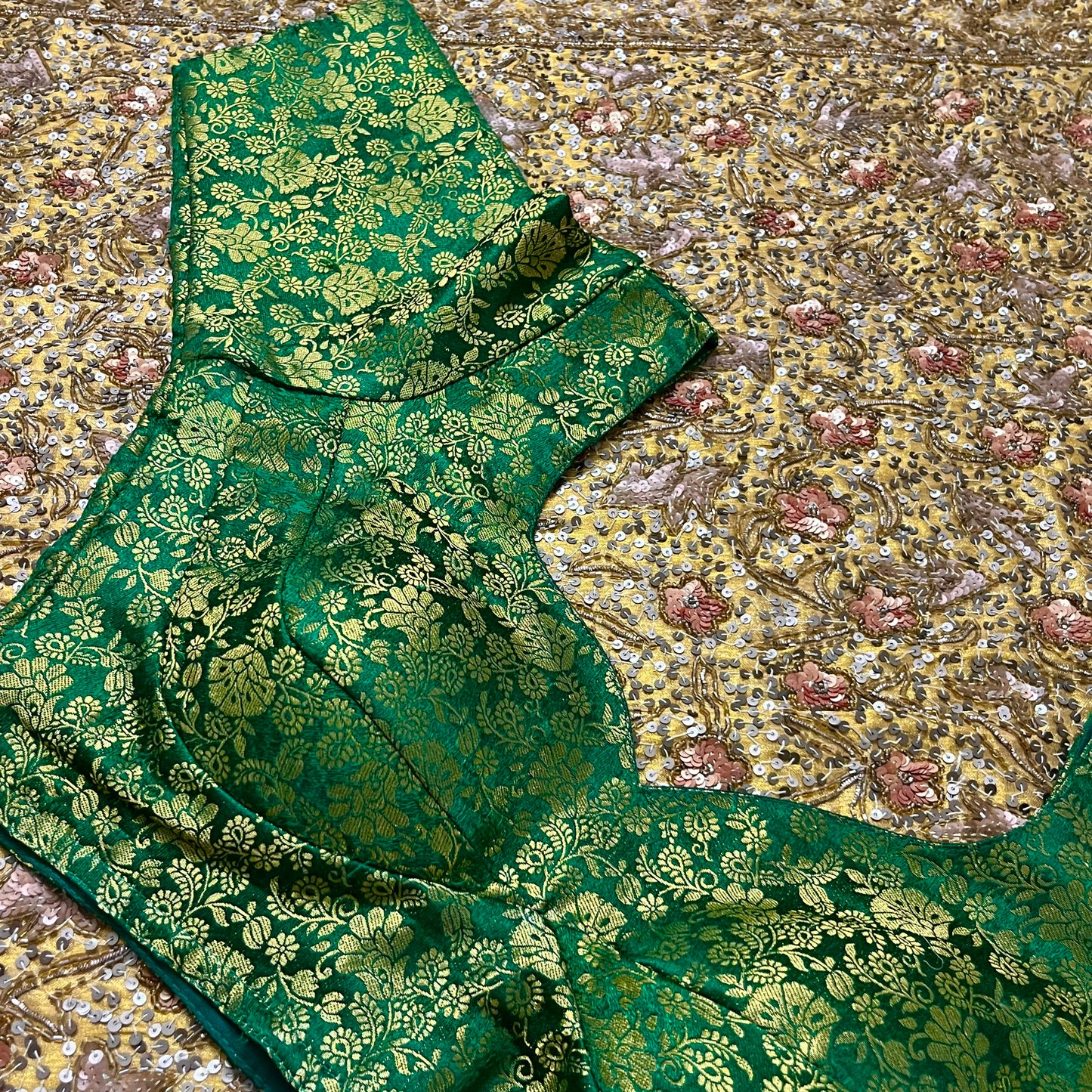 Green stitched padded brocade silk blouse