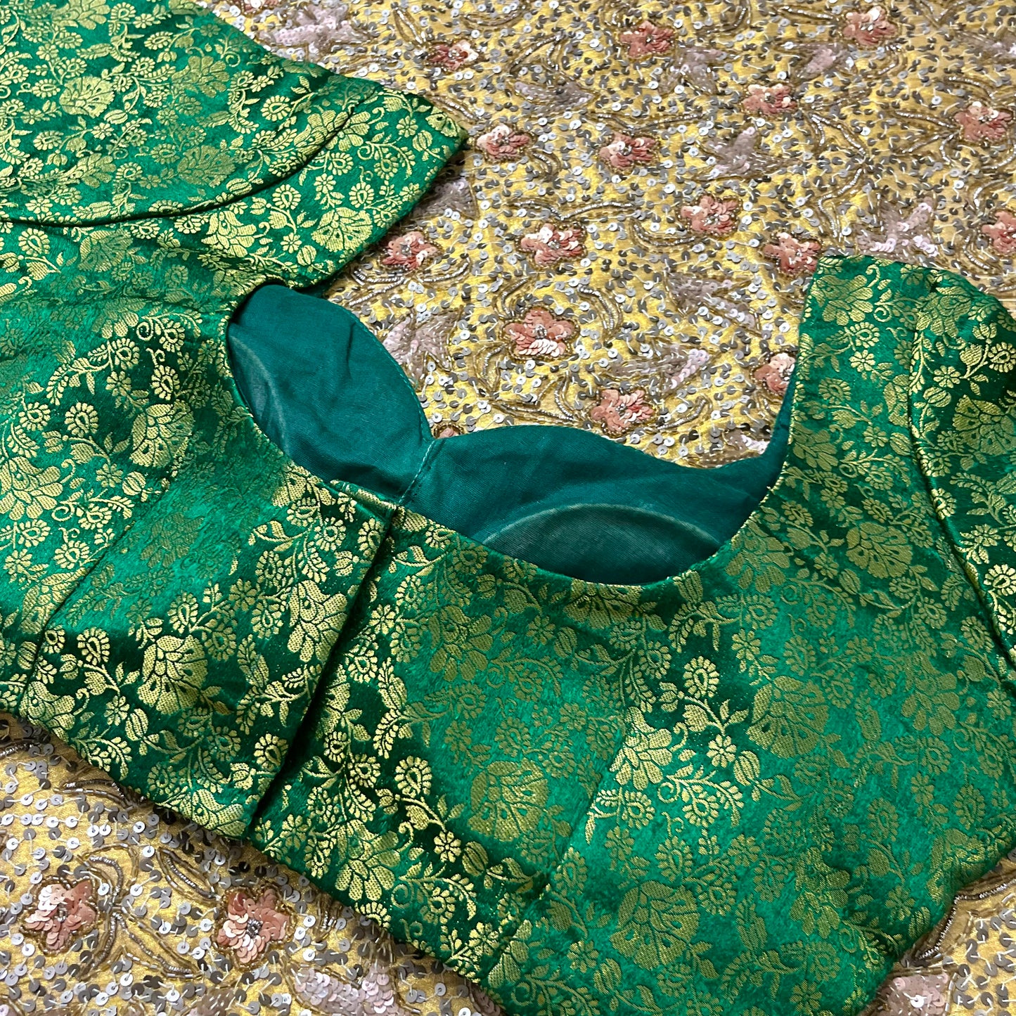 Green stitched padded brocade silk blouse