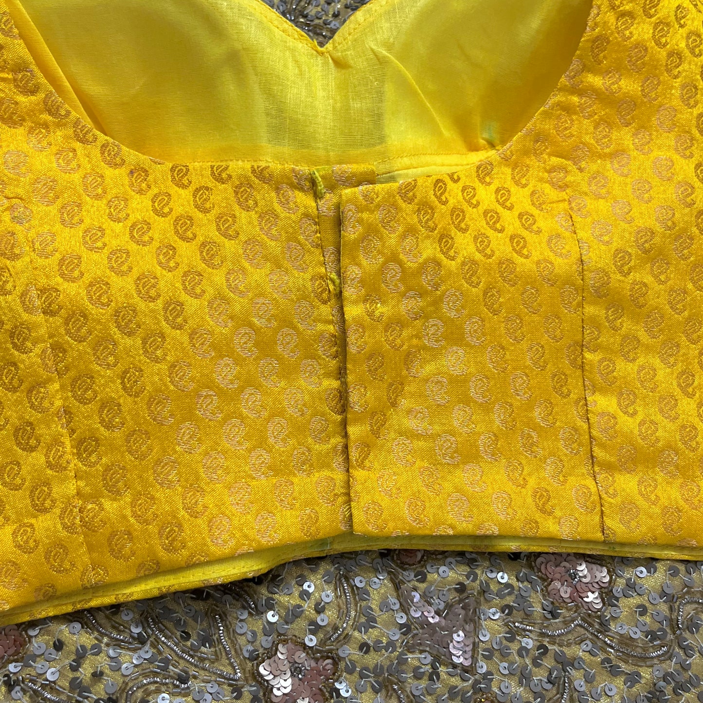 Yellow stitched padded brocade silk blouse