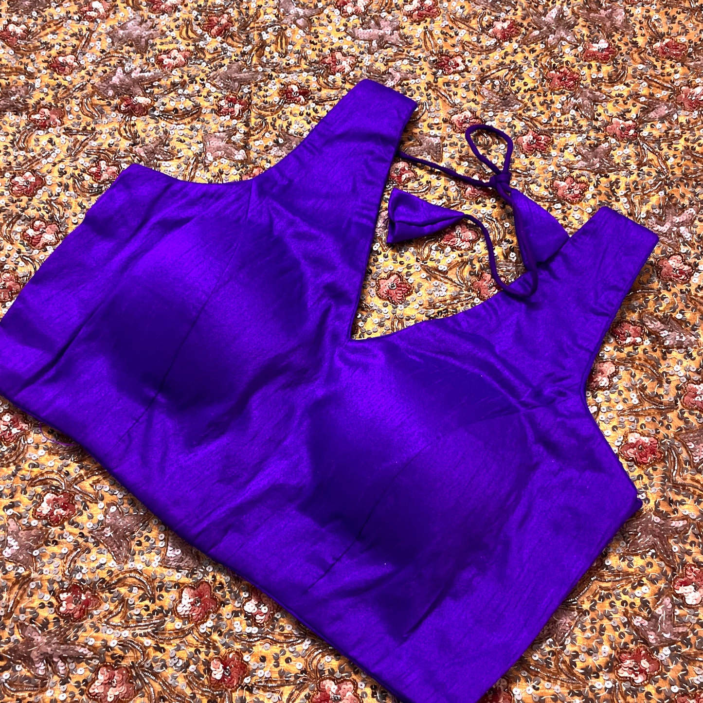 Dark purple stitched padded silk blouse