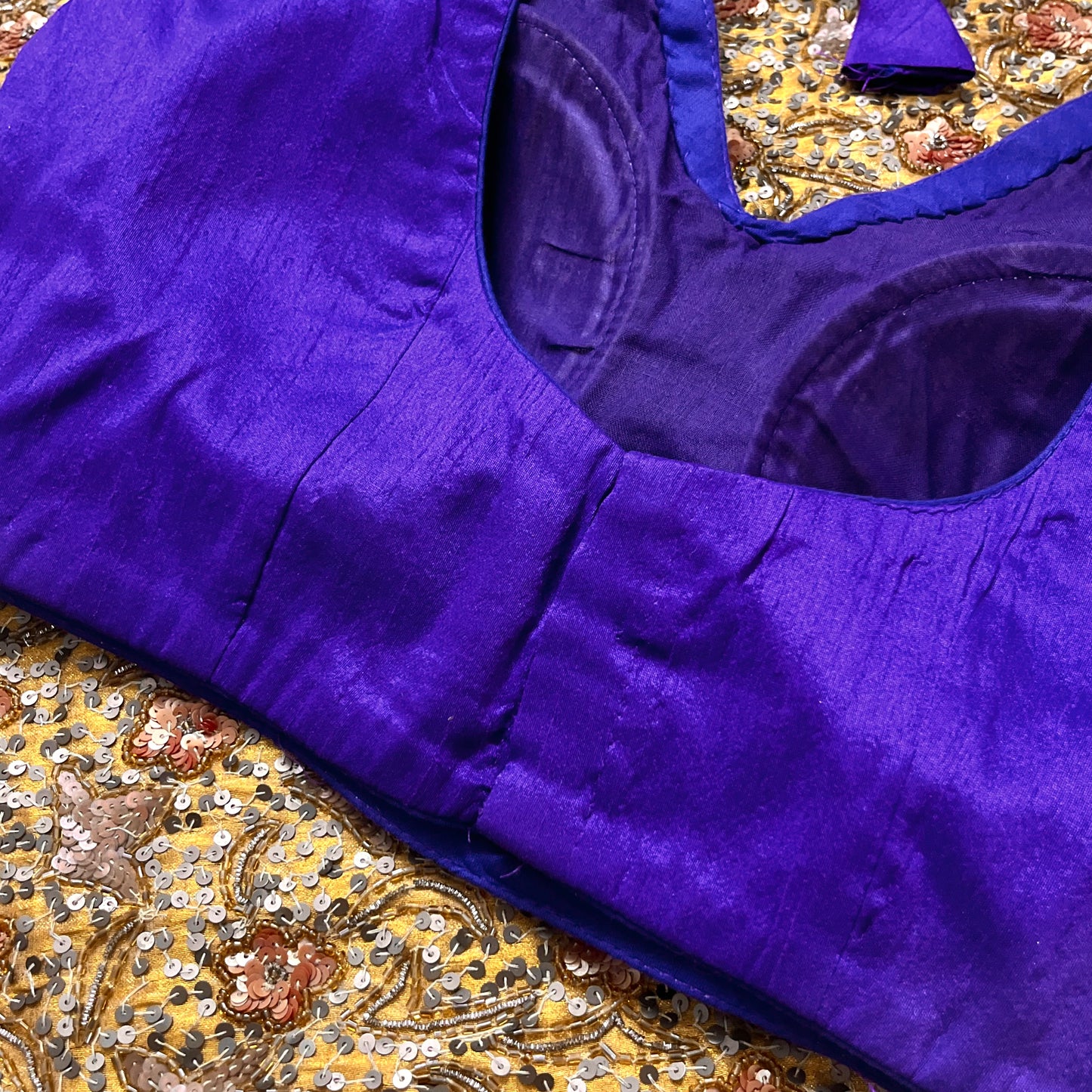 Dark purple stitched padded silk blouse