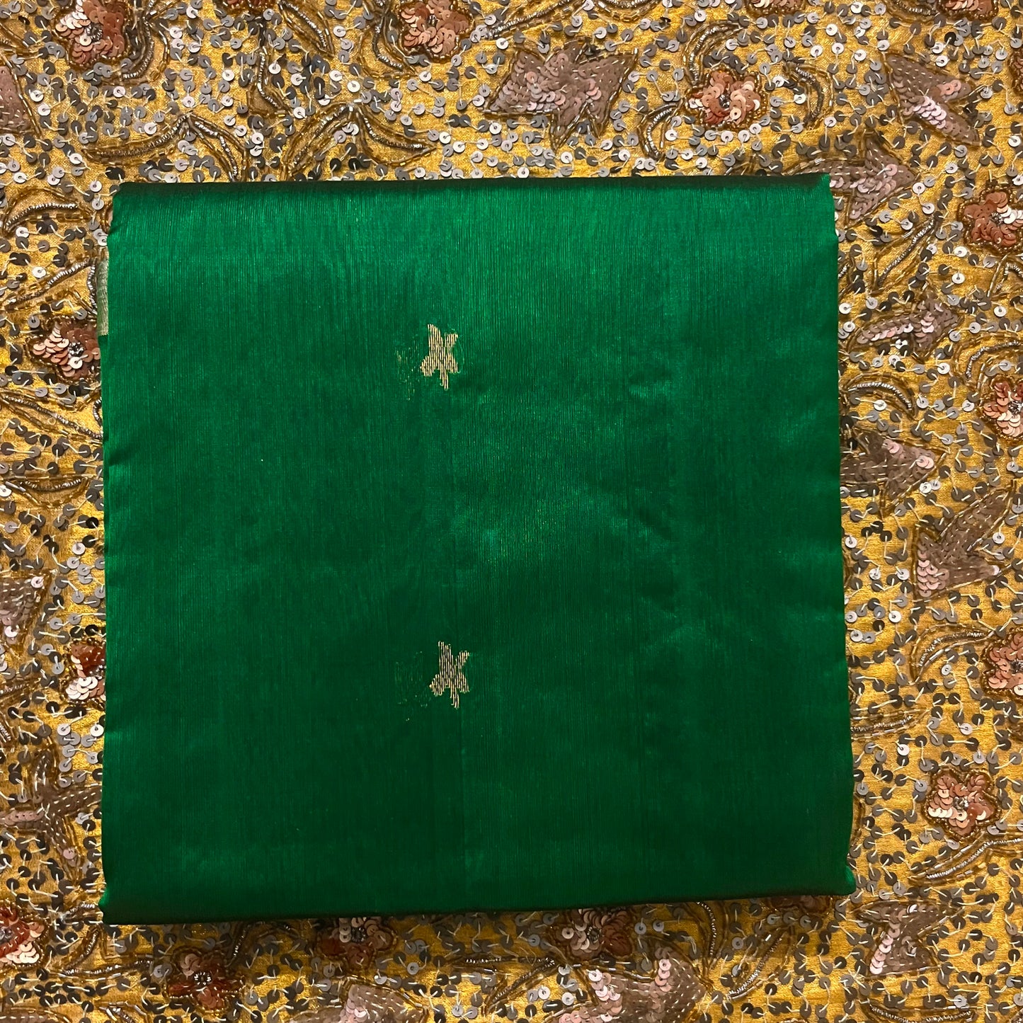 Emerald green chanderi silk saree with flower bootis all over