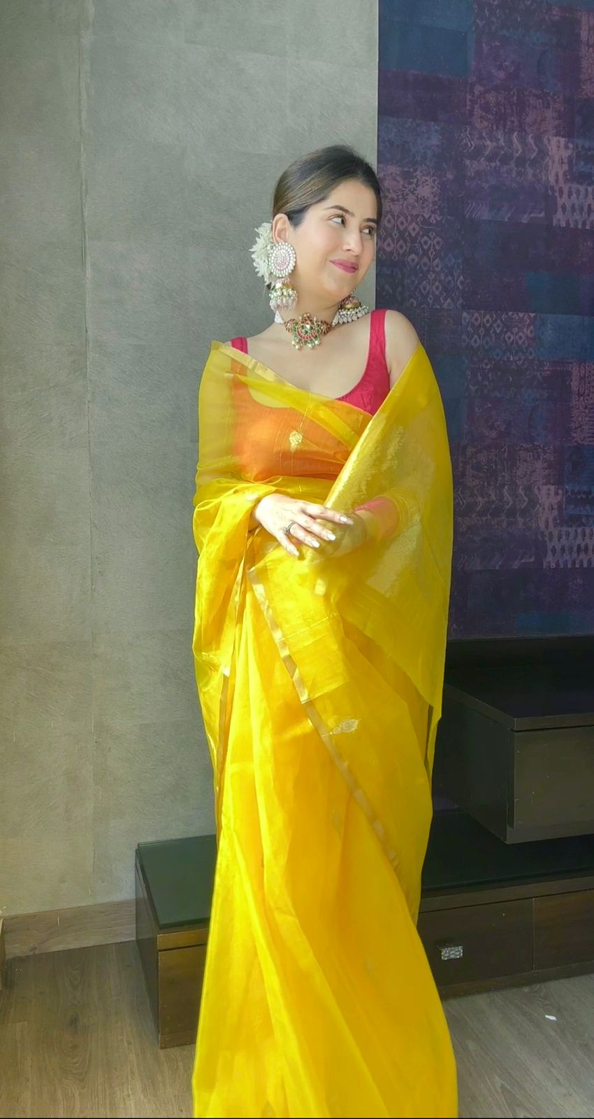 Yellow chanderi organza silk saree with jhumka motifs all over