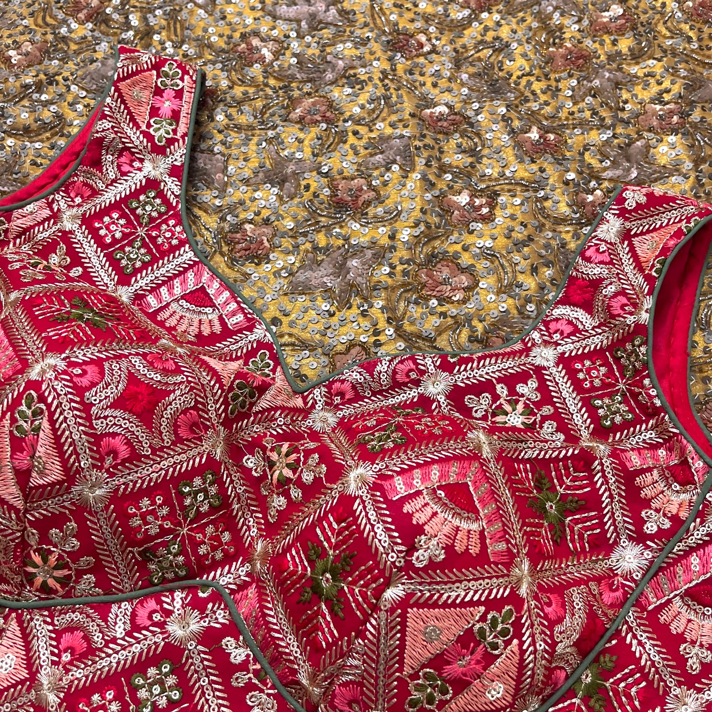 Red stitched padded blouse with threadwork all over