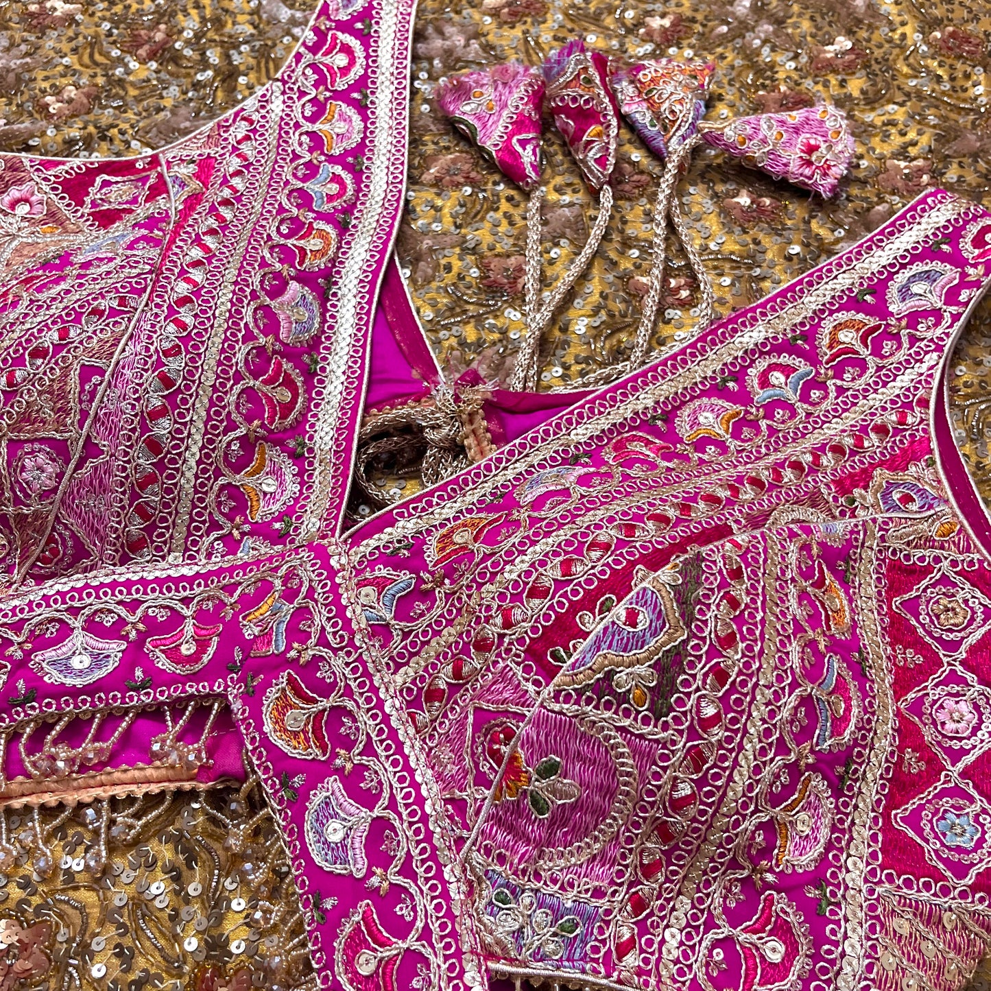 Pink stitched padded blouse with threadwork all over