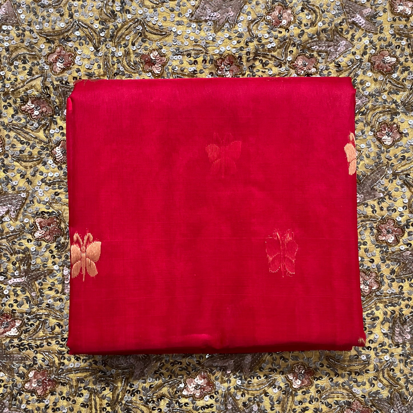 Red chanderi organza silk saree with butterfly motifs all over