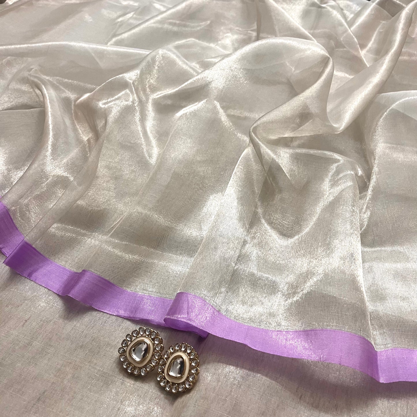 Silver white and lilac chanderi tissue silk saree