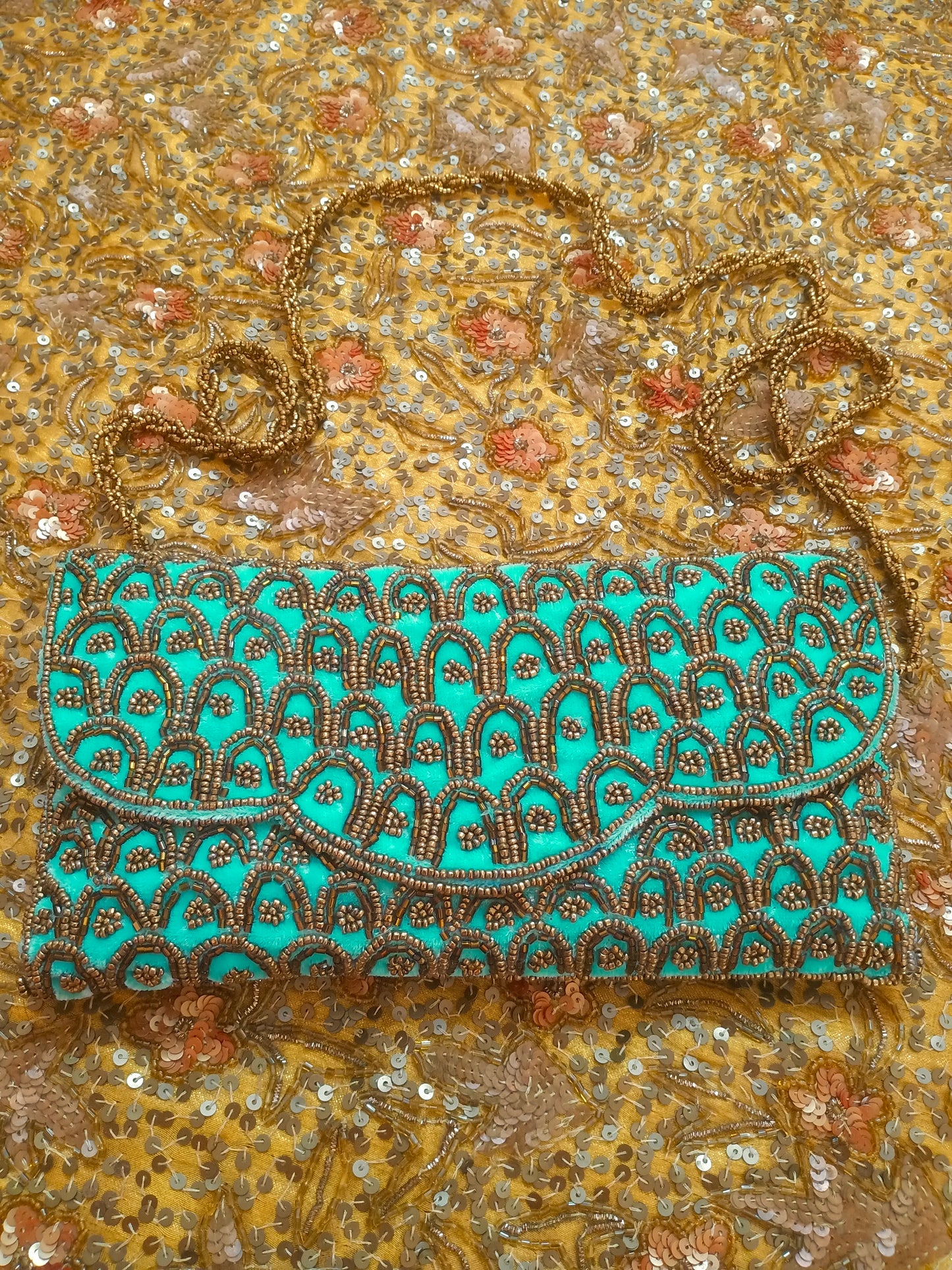 Turquoise embellished velvet purse