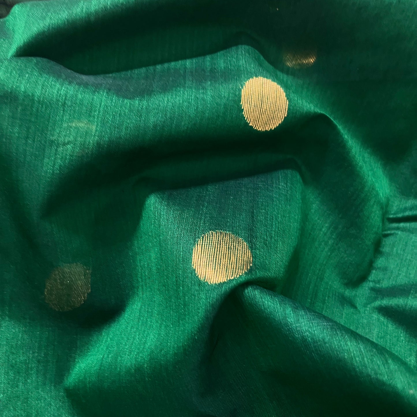 Dark green chanderi saree with zari bootis all over