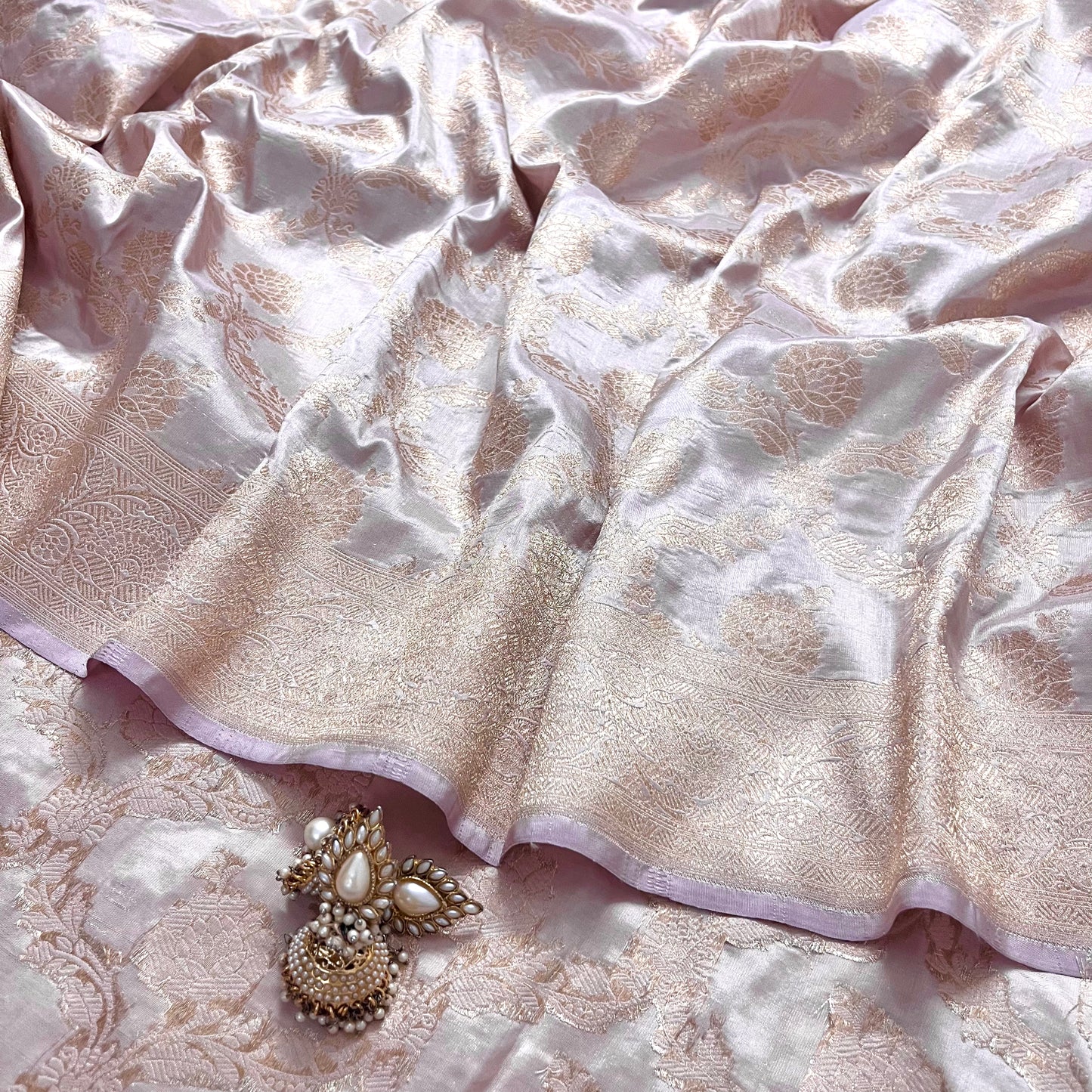 Sand pink banarasi silk saree with zari jaal work all over