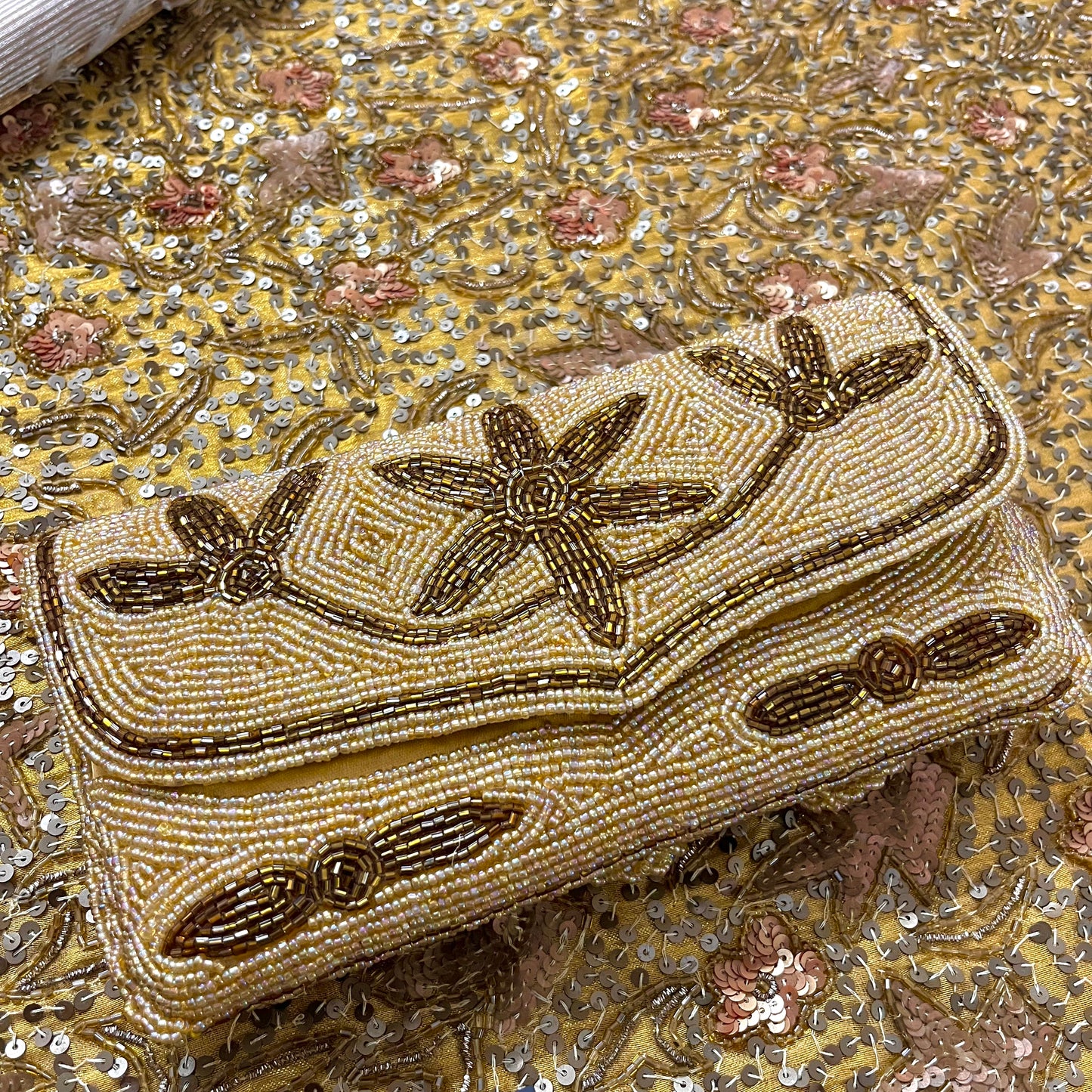 Golden bead embellished purse