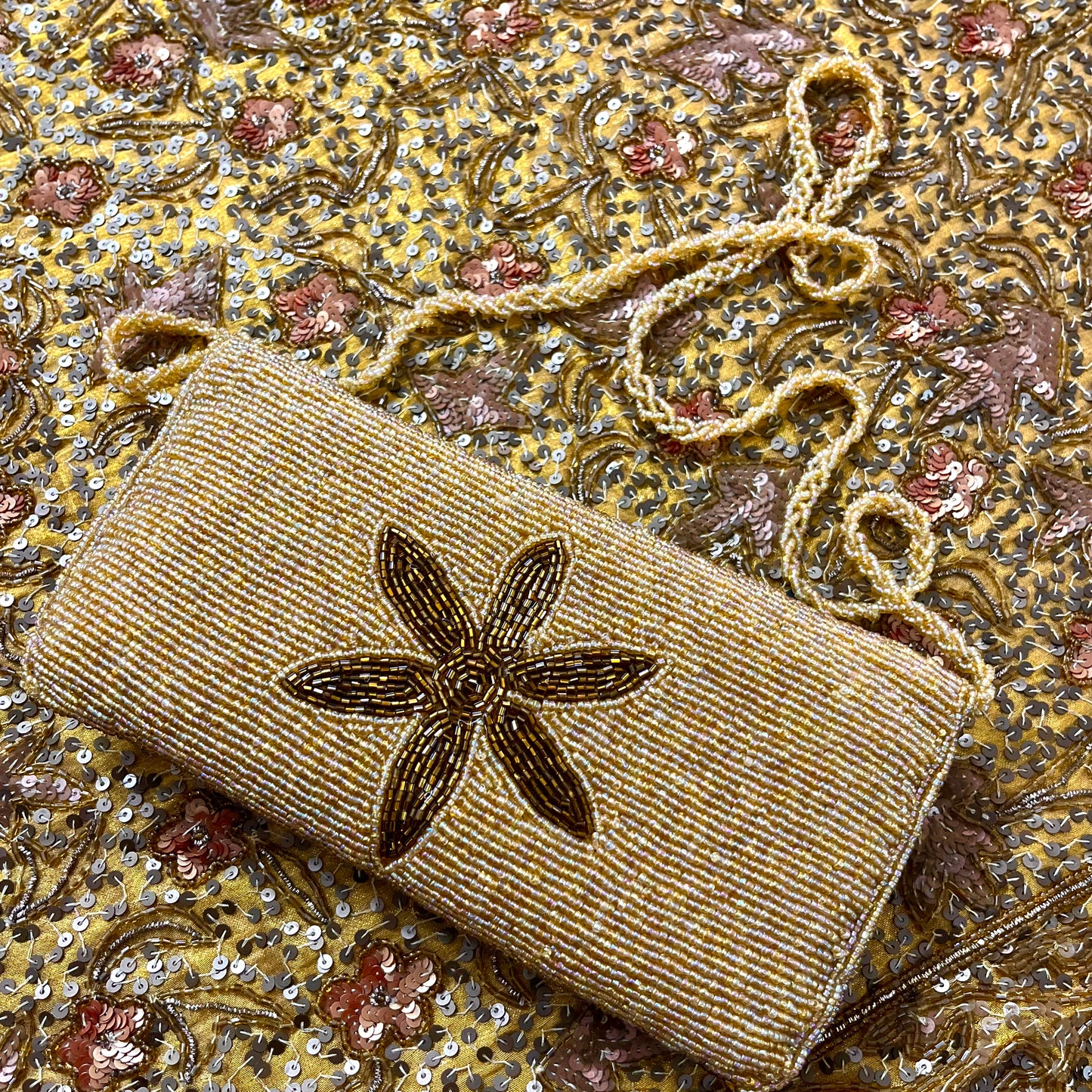 Golden bead embellished purse