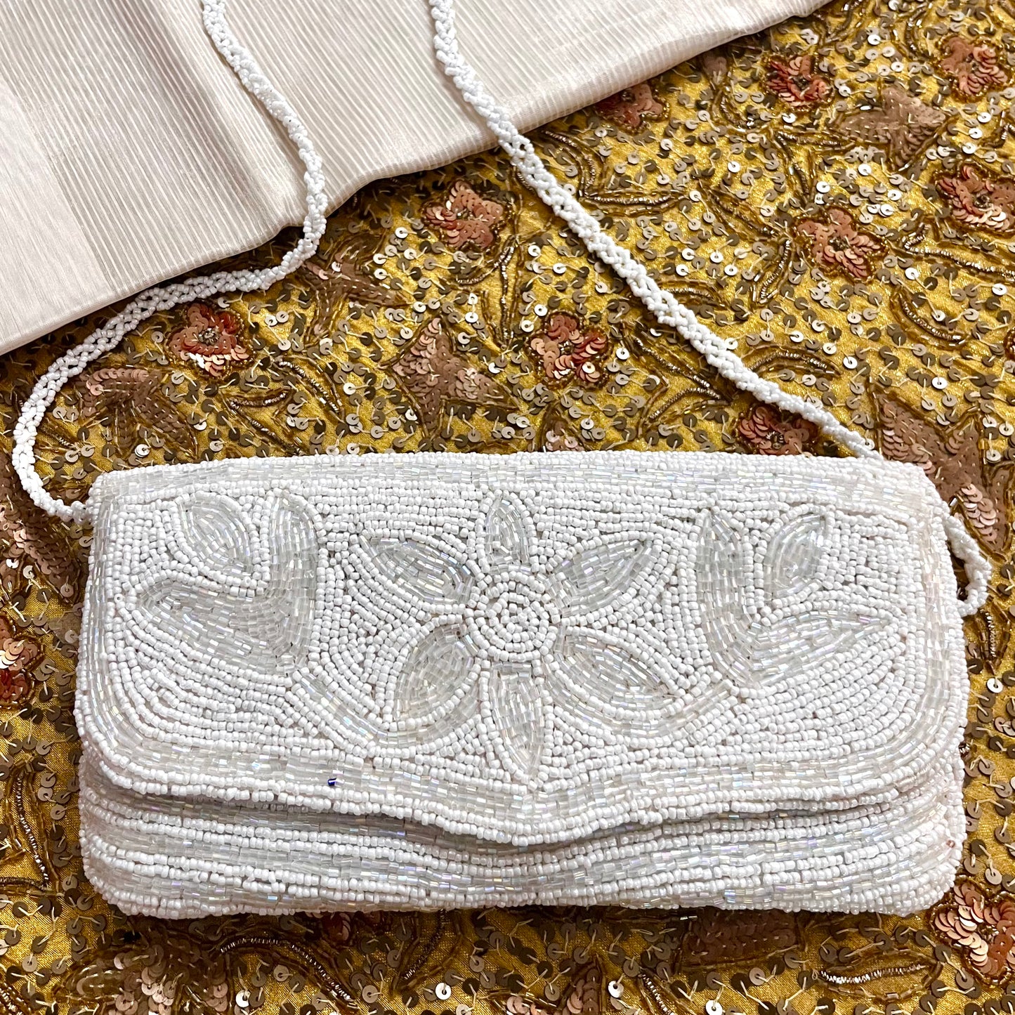 White pearl embellished purse