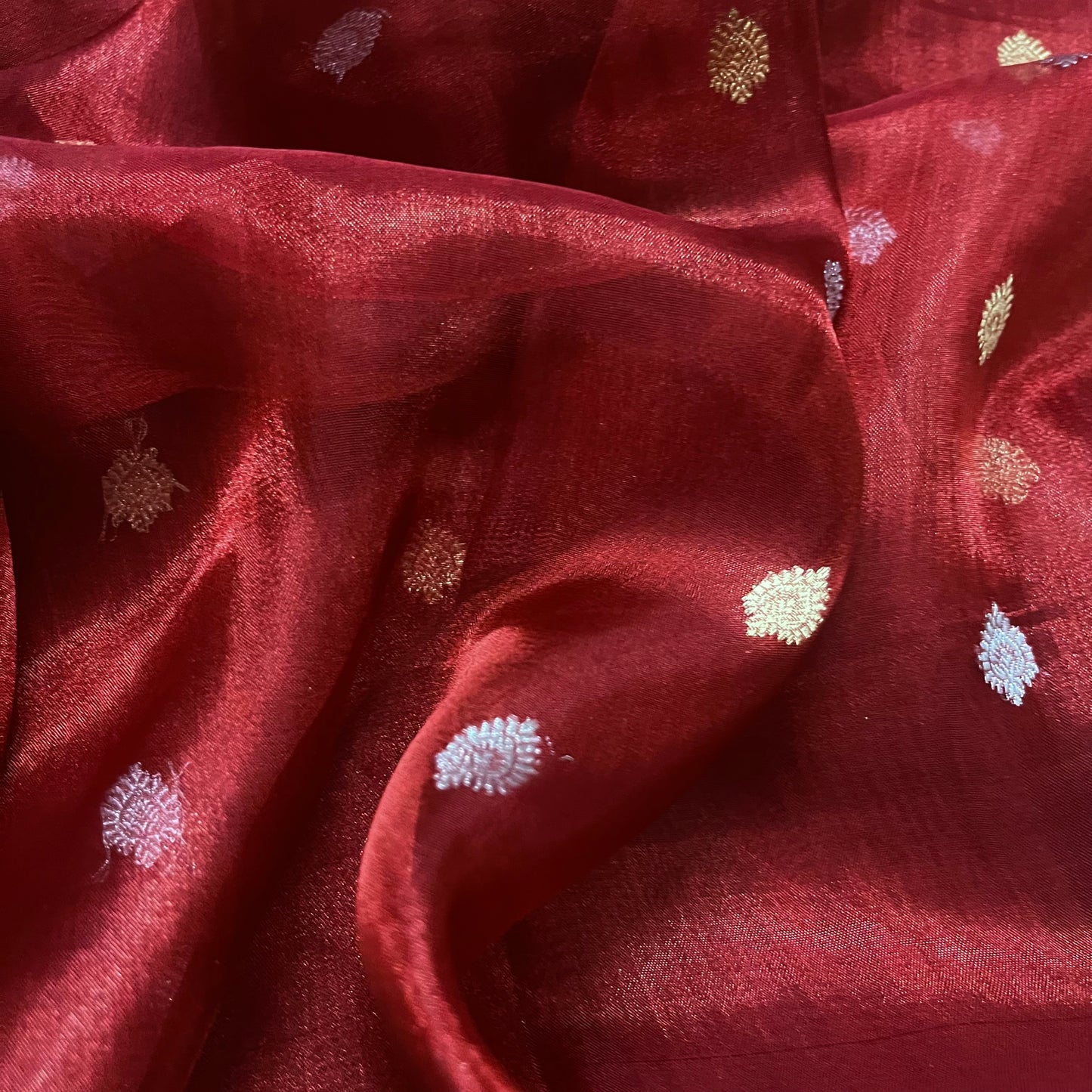 Maroon banarasi tissue silk saree with zari bootis and zari border