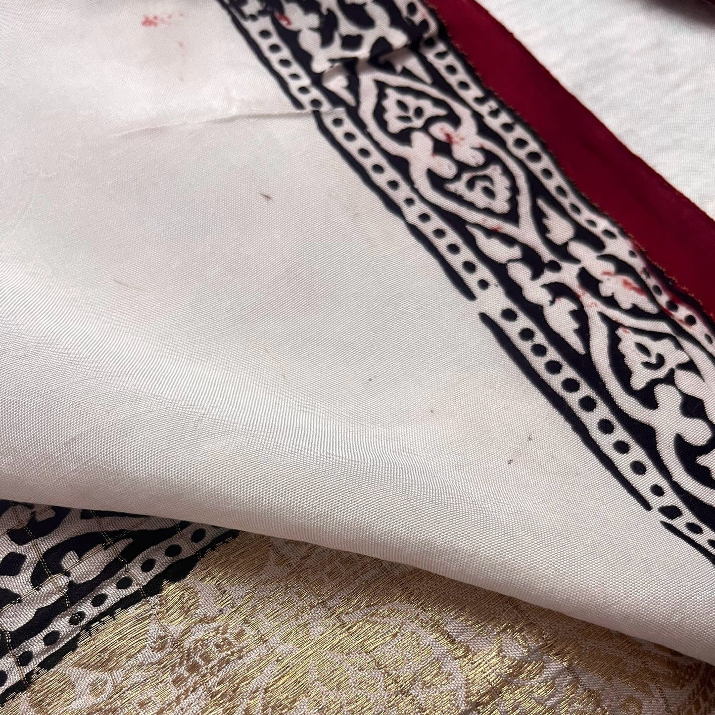 Maroon and white bagh print banarasi saree with zari border