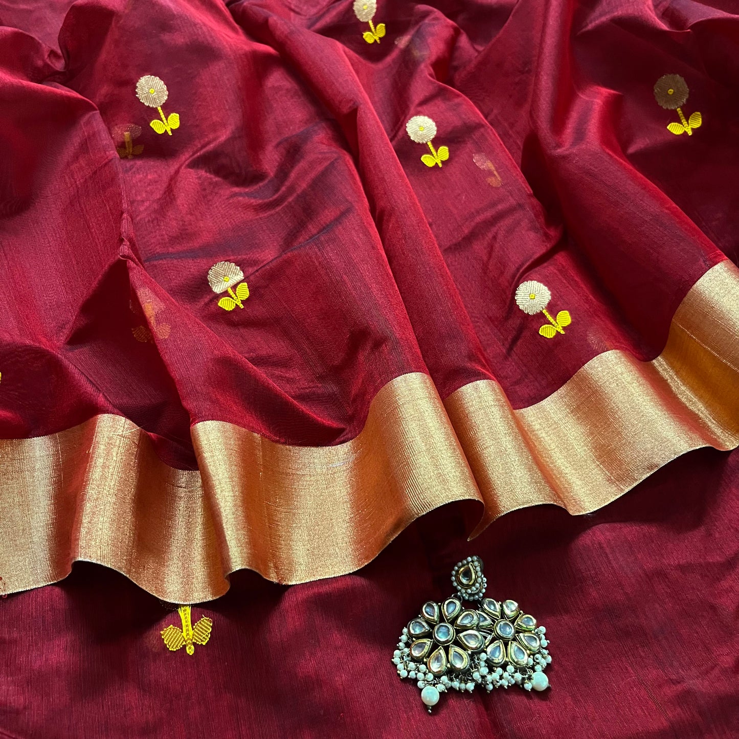 Deep Maroon Chanderi saree with flower motifs all over