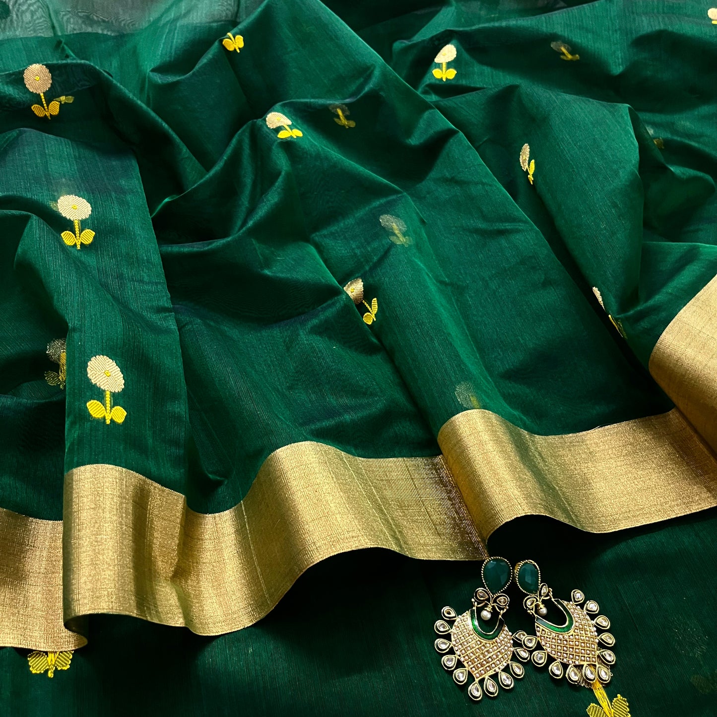 Bottle green chanderi saree with flower motifs all over