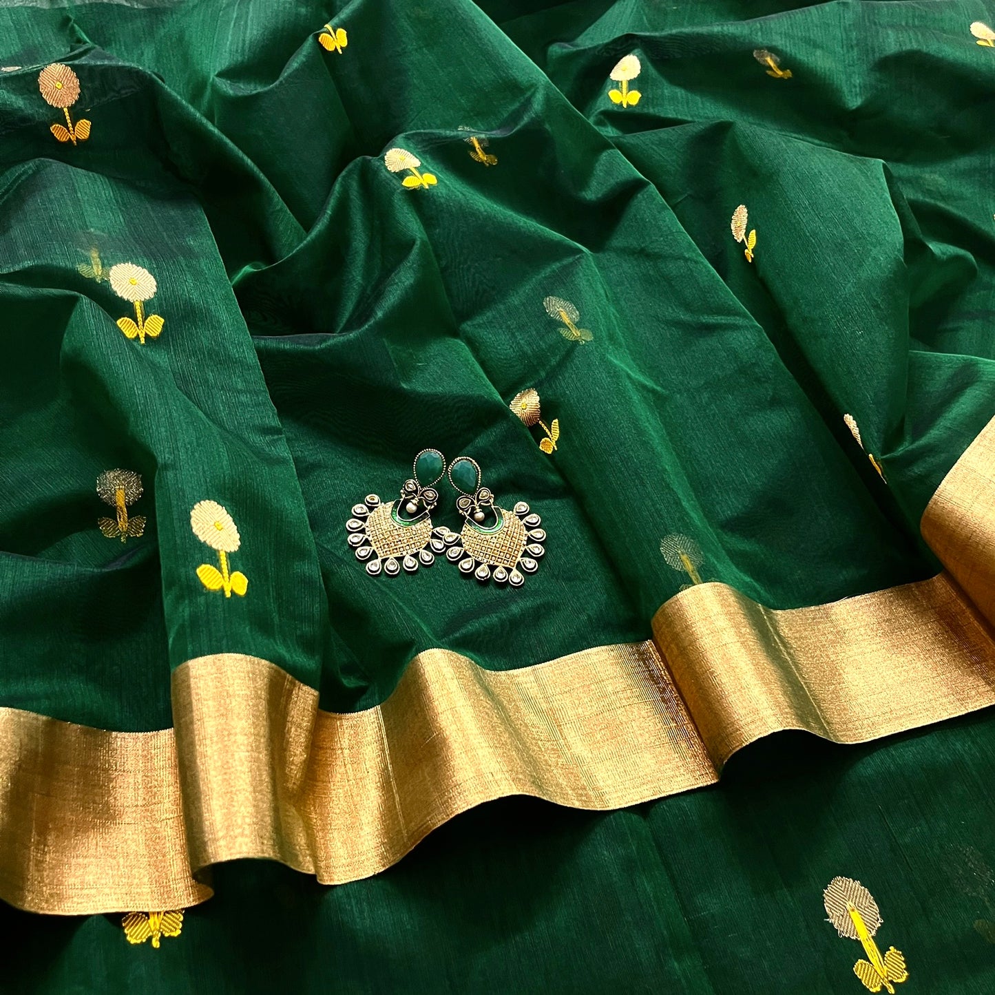 Bottle green chanderi saree with flower motifs all over