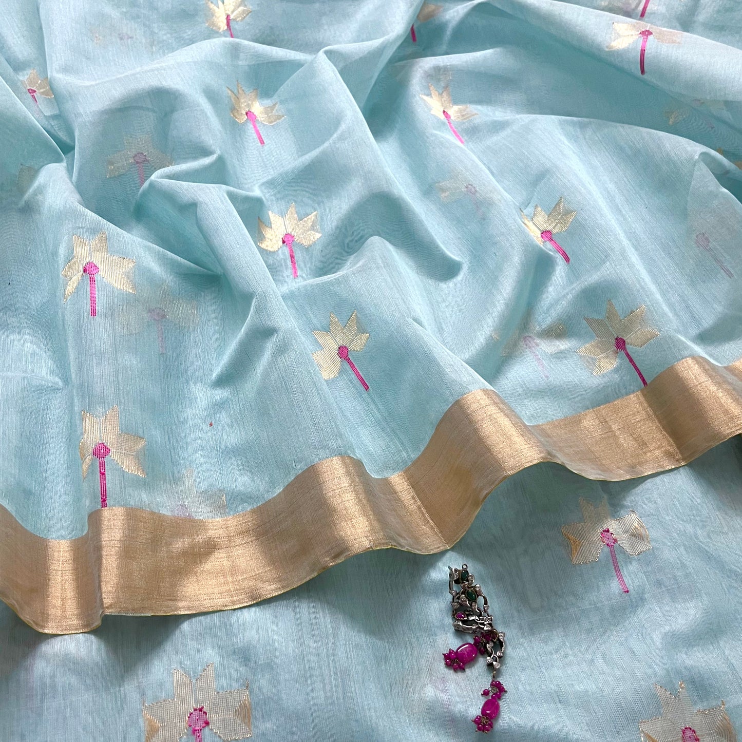 Light blue chanderi saree with flower motifs all over