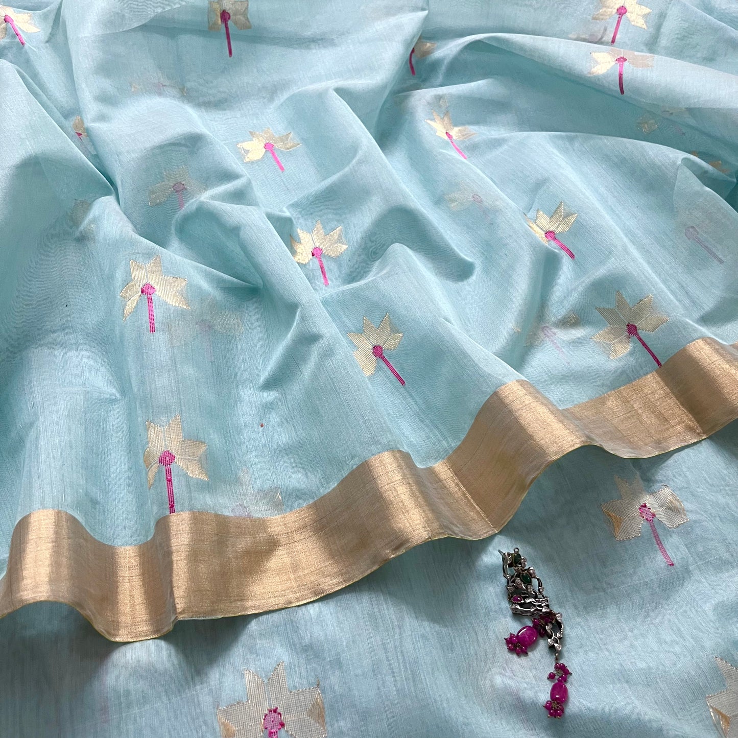 Light blue chanderi saree with flower motifs all over