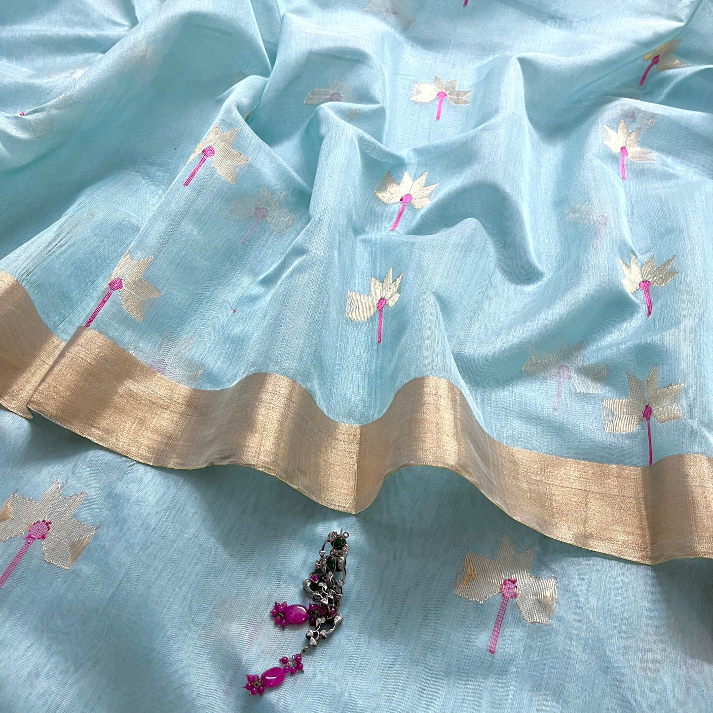 Light blue chanderi saree with flower motifs all over