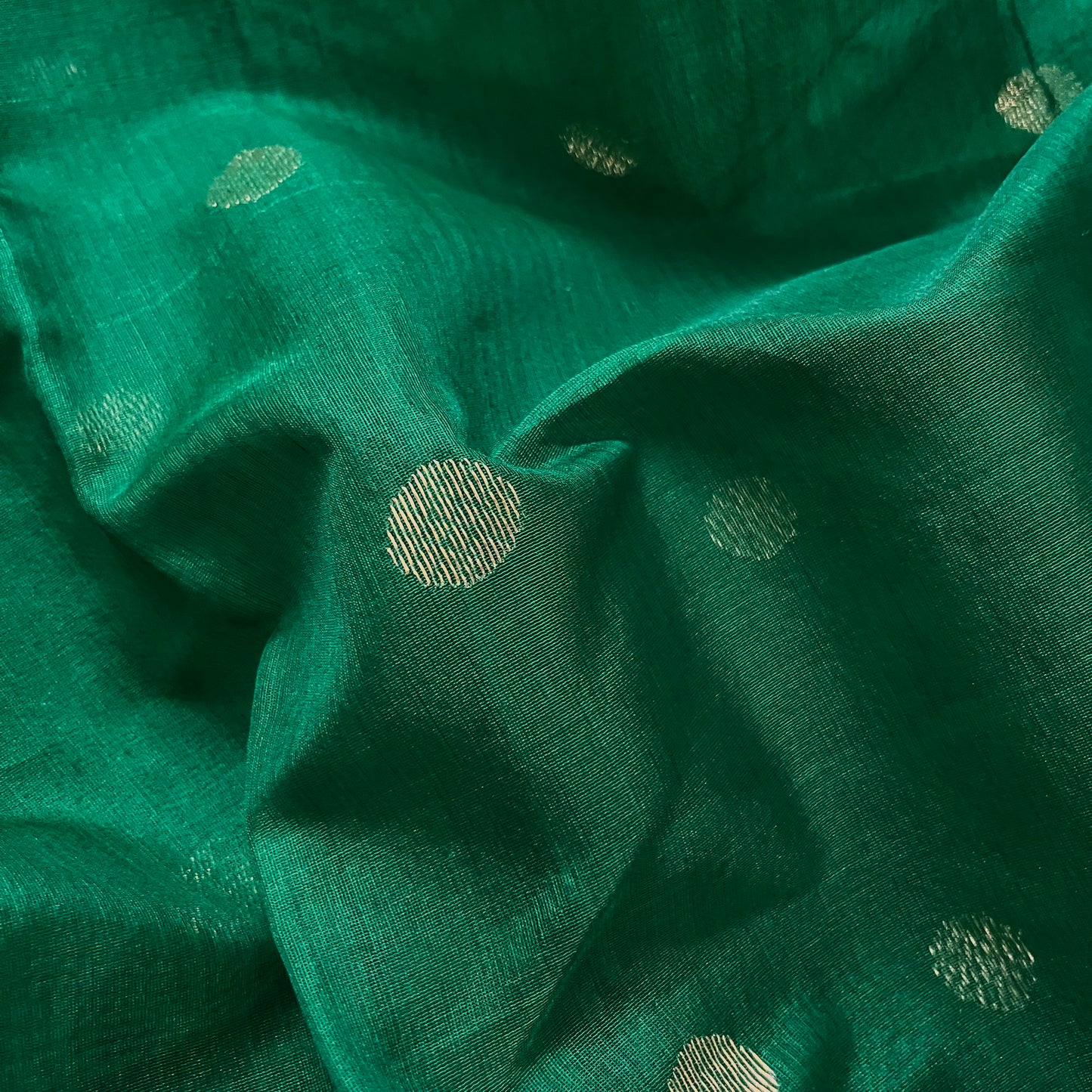 Dark green chanderi saree with zari motifs on pallu