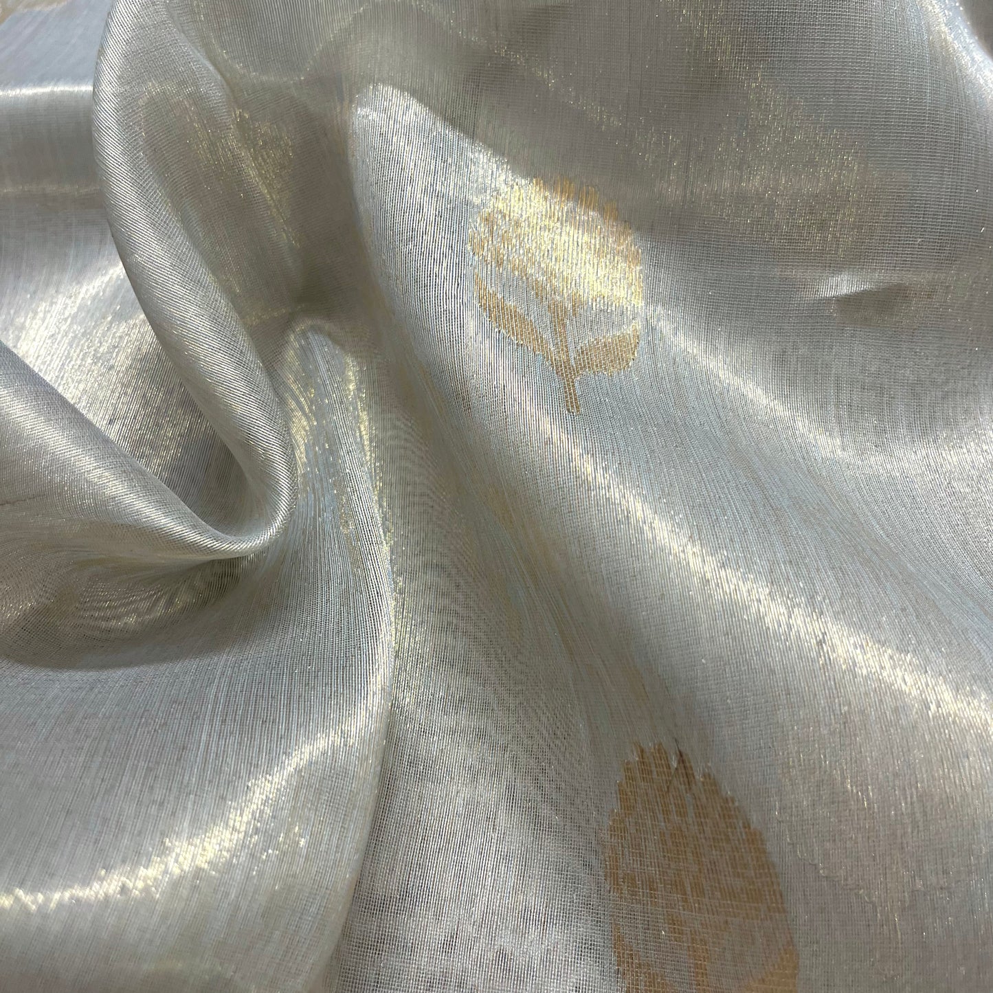 Silver gold maheshwari tissue silk saree with flower motifs all over