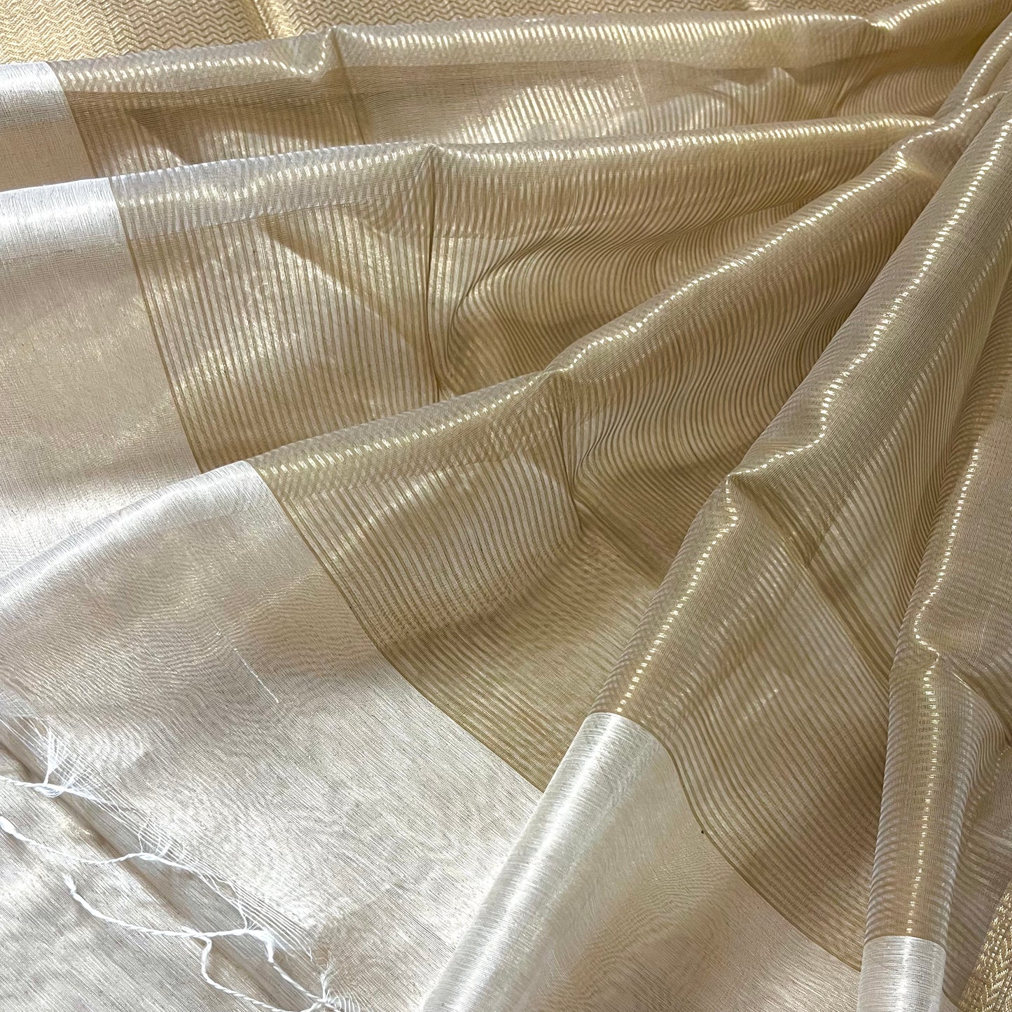 Cream gold maheshwari tissue silk saree with flower motifs all over