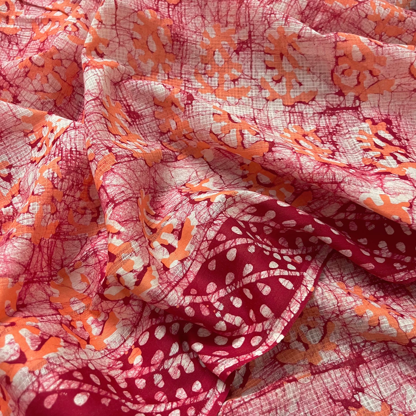 Off white, orange & red batik print saree