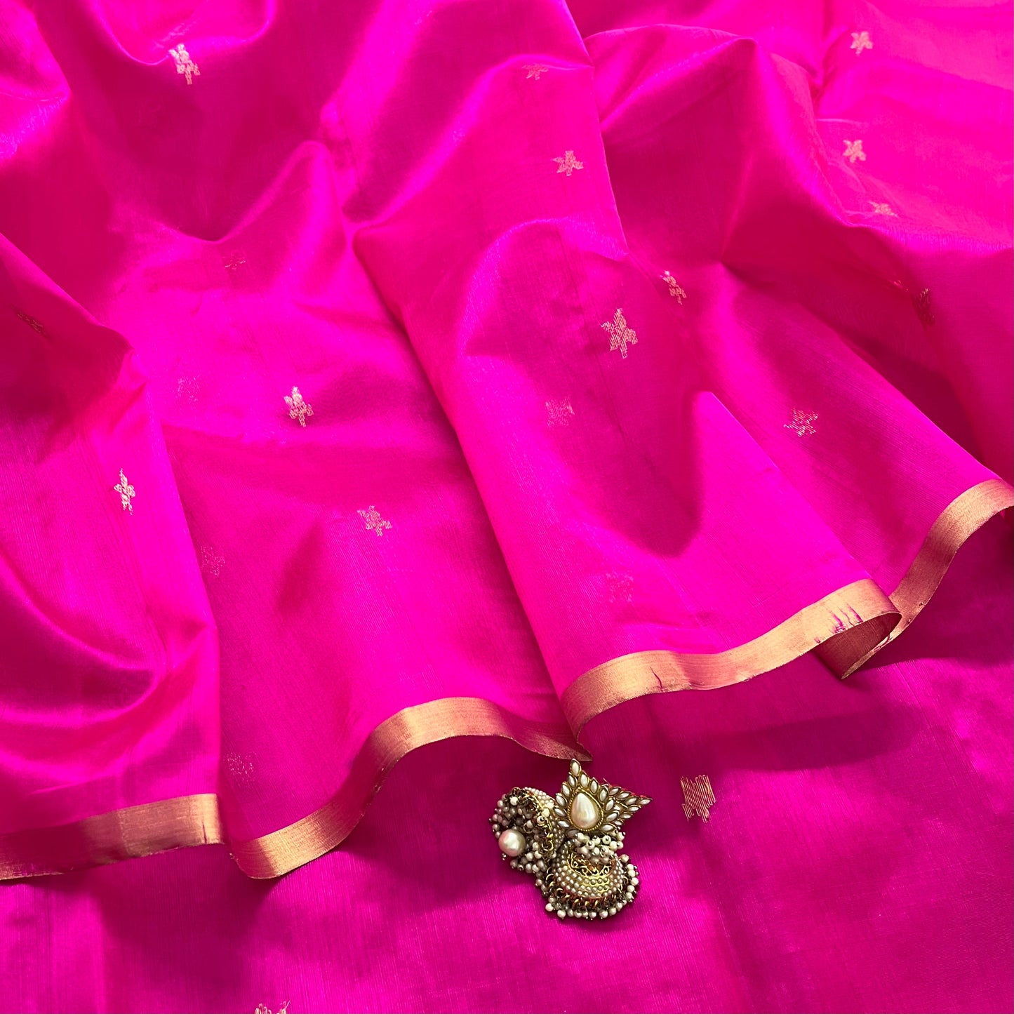 (Shop the look) Rani pink chanderi silk saree with flower bootis all over