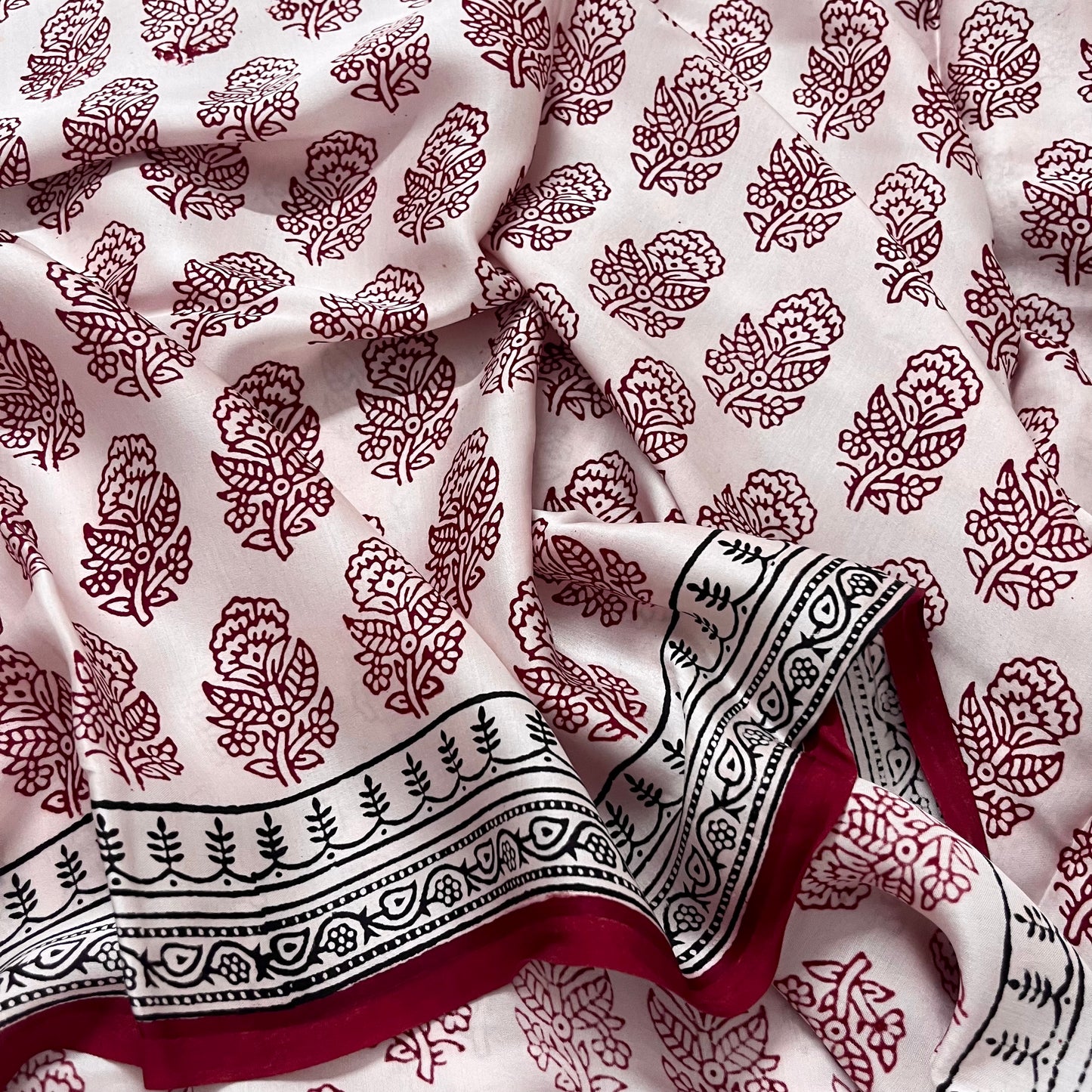 White and red bagh print saree