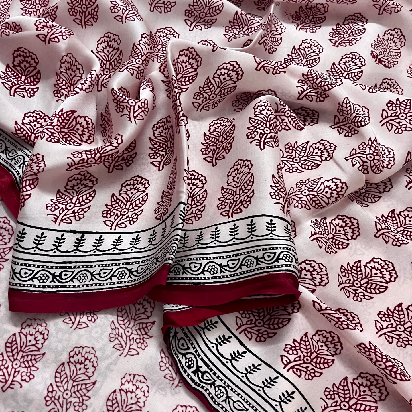 White and red bagh print saree